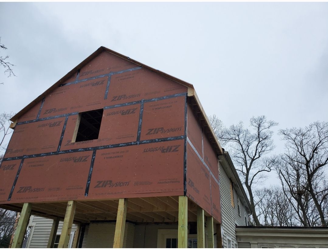 Wood Clapboards and vinyl Slate roof with new Pella windows in Wellesley. by UBrothers Construction