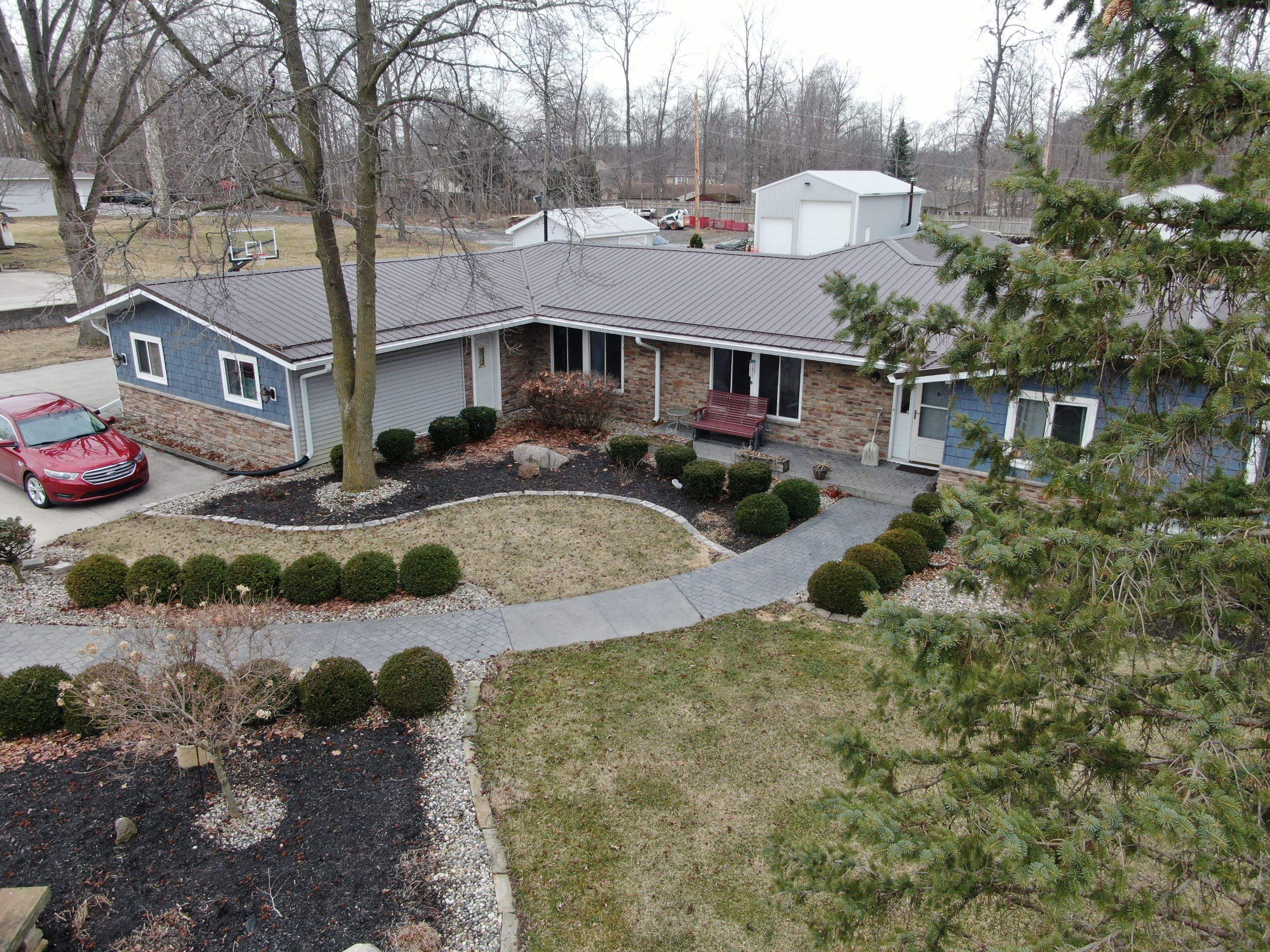Residential Roofing Installation using Exposed Fastener Metal Roof by 4Ever Metal Roofing