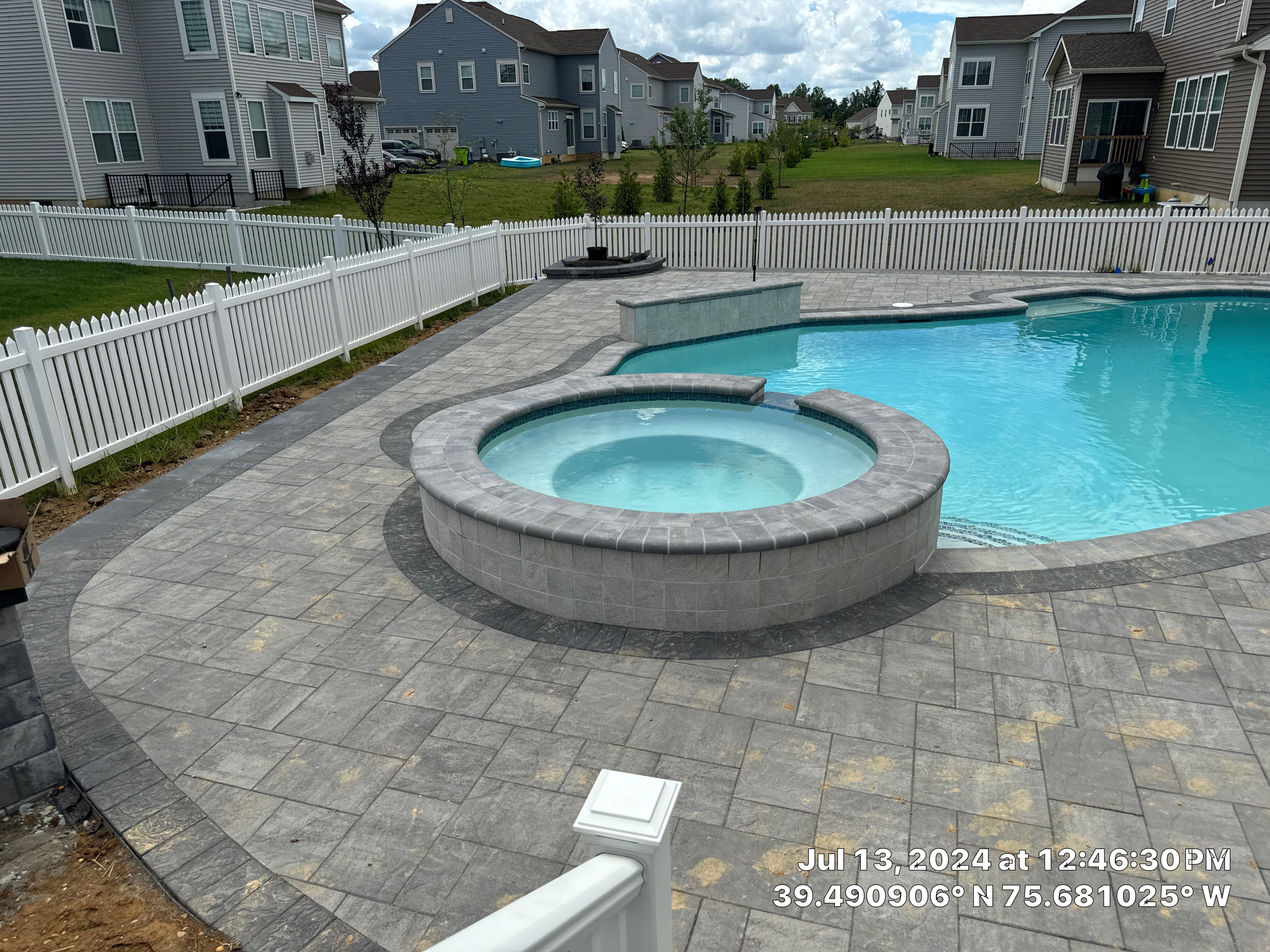 Pool and Hardscape Design in Delaware | Belgard Paver Patio & Outdoor Living Space by Studio G Indoor Spaces & Outdoor Living