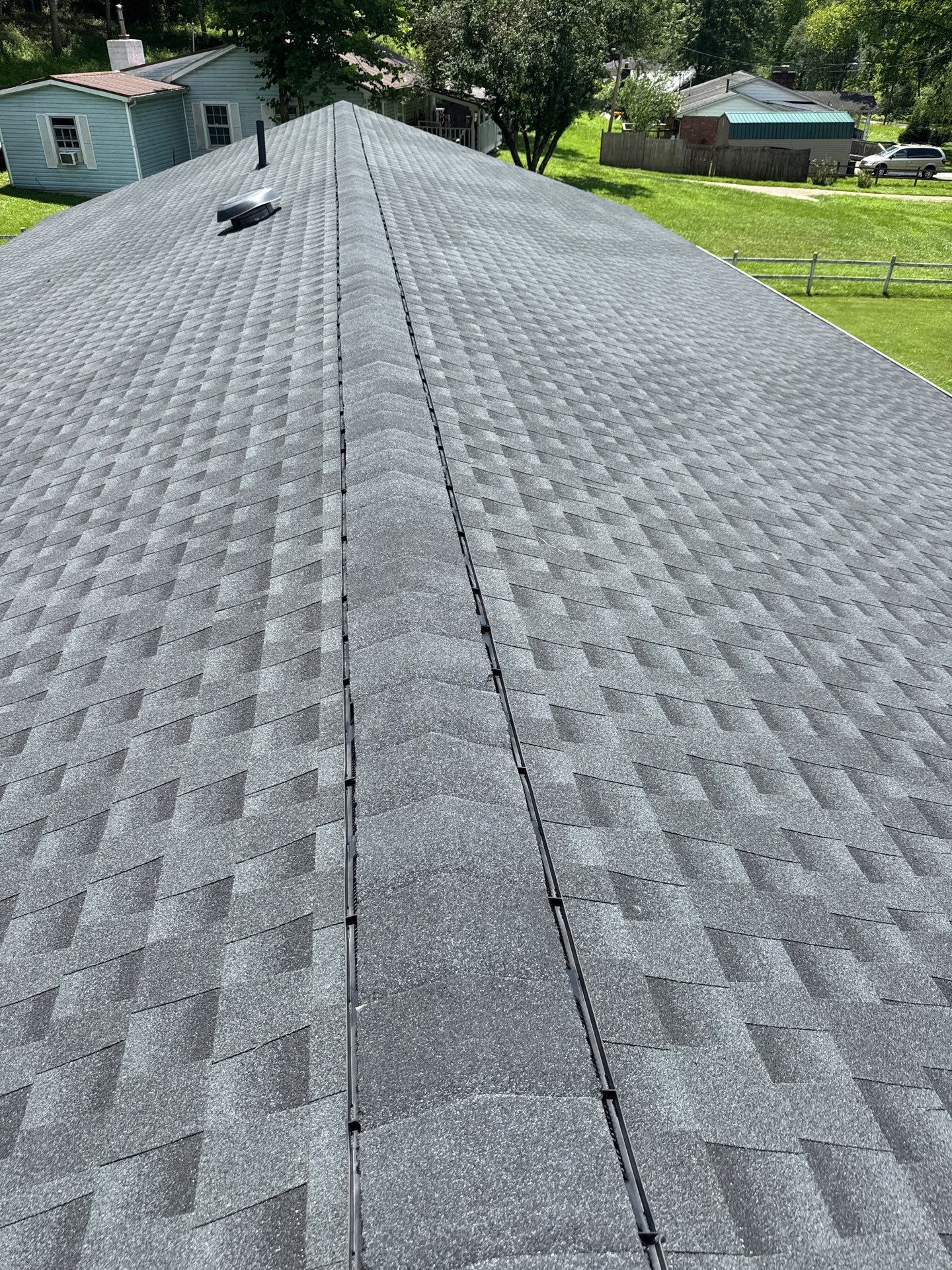 Residential Roofing Installation using GAF Timberline HDZ Charcoal by Rainstoppers Roofing