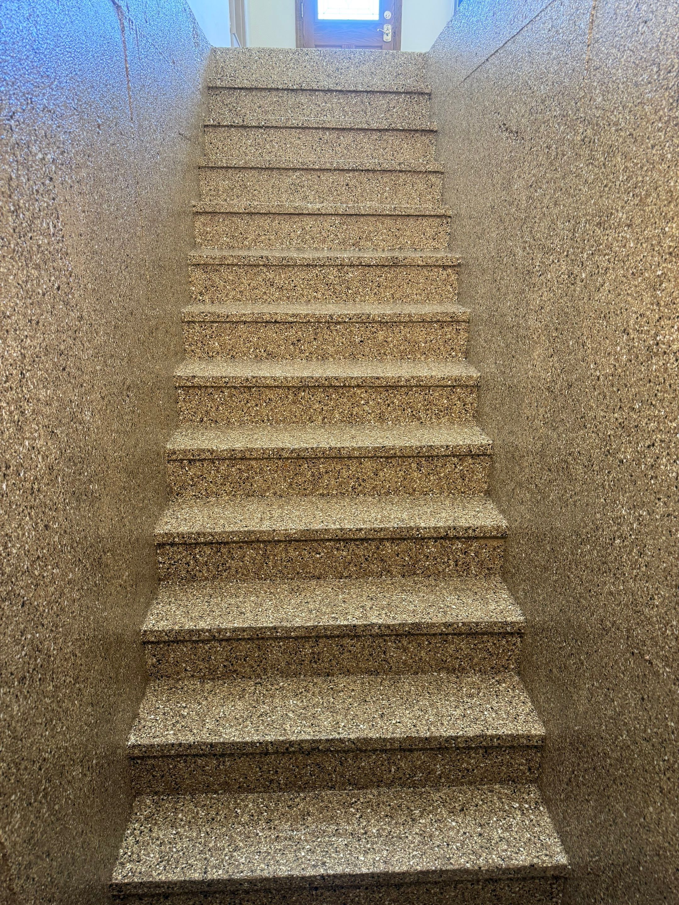 Custom Polyaspartic Garage Floor and Stairwell Coating in Pipestone by Select Painting, Coatings & Garage Cabinets