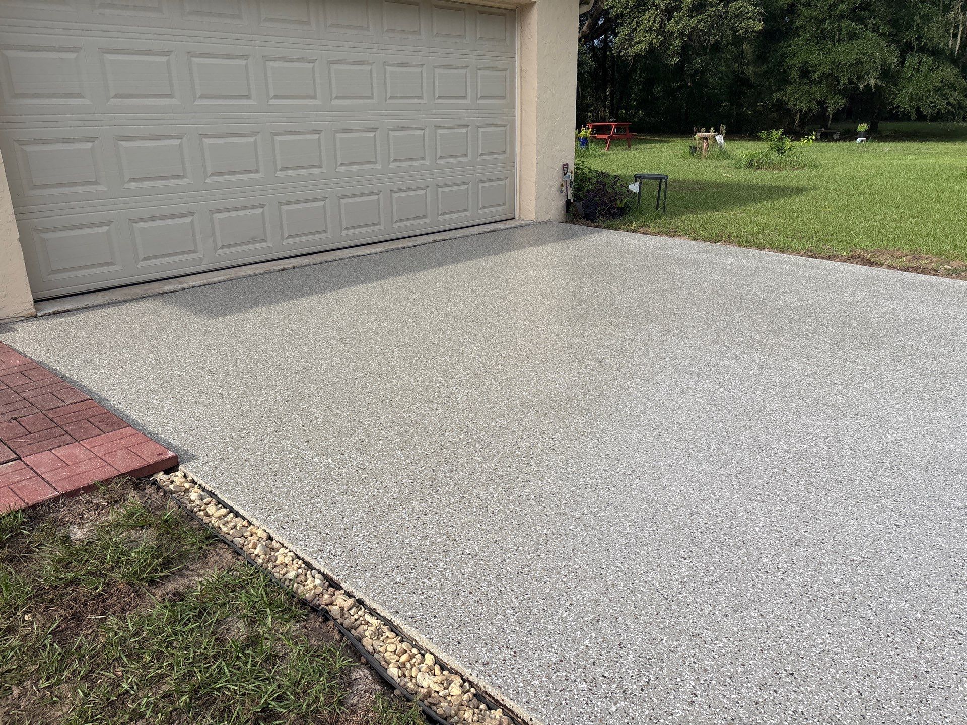 Pool Deck and Driveway in Pebble Beach by Cross Creek Concrete Coatings