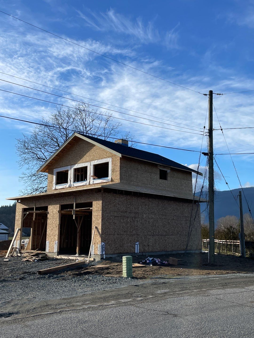 Residential Roofing Installation using 16" Prolok metal and Owens corning shingles by Top Notch Roofing Inc