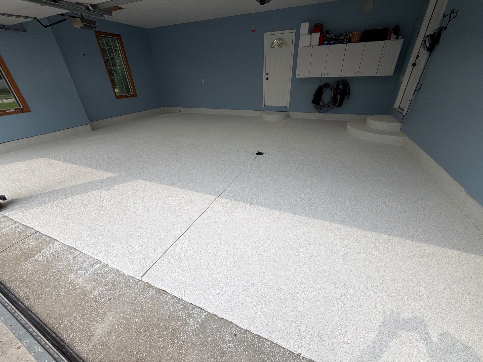 Custom Epoxy Flake Garage Floor Installation in Norton Shores by Gordon Painting