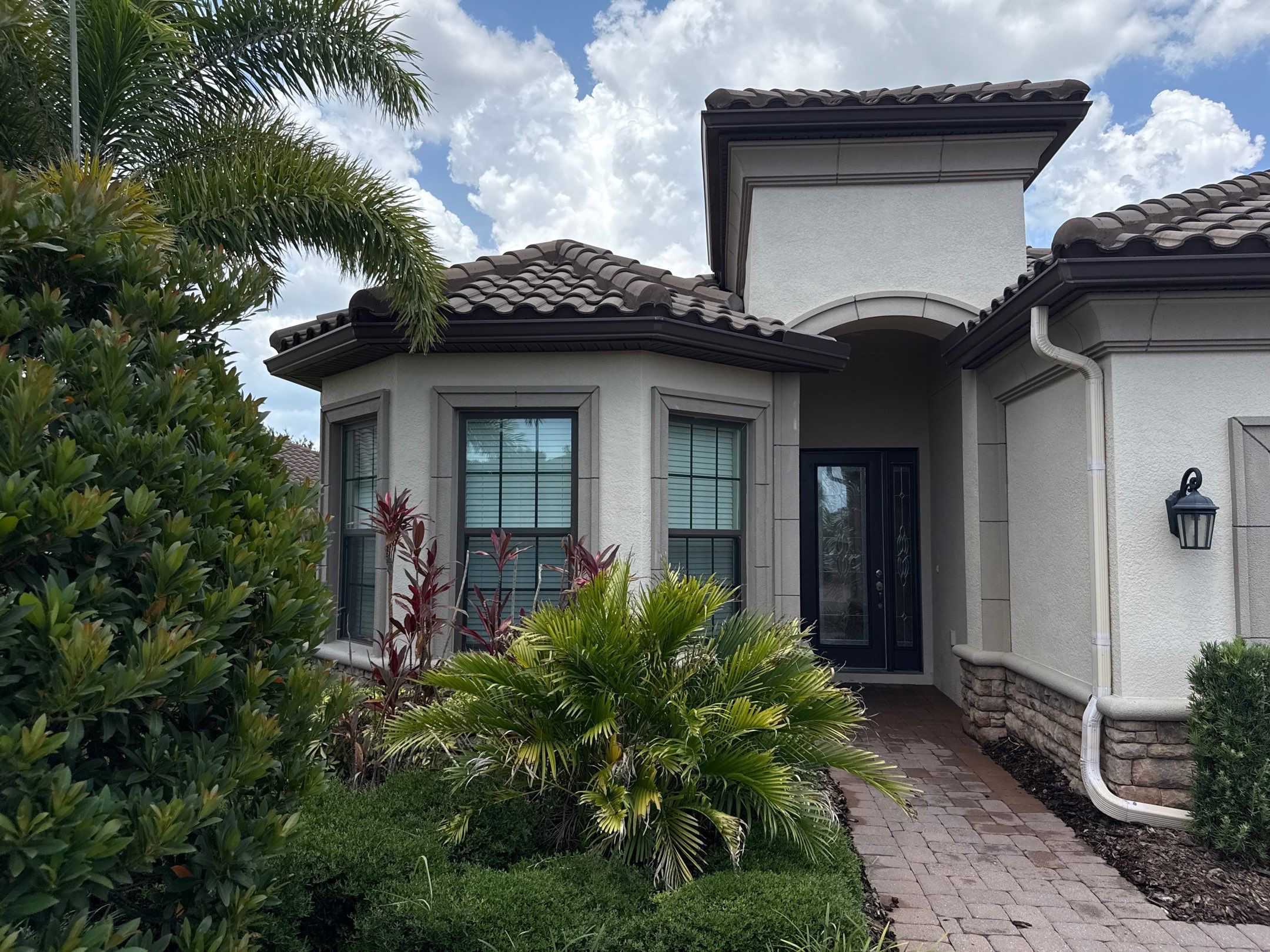 Concrete Tile Roof, Paver Driveway & Lanai Cleaning – Artisan Lakes Esplanade, Palmetto, FL by Sunshine AquaWash