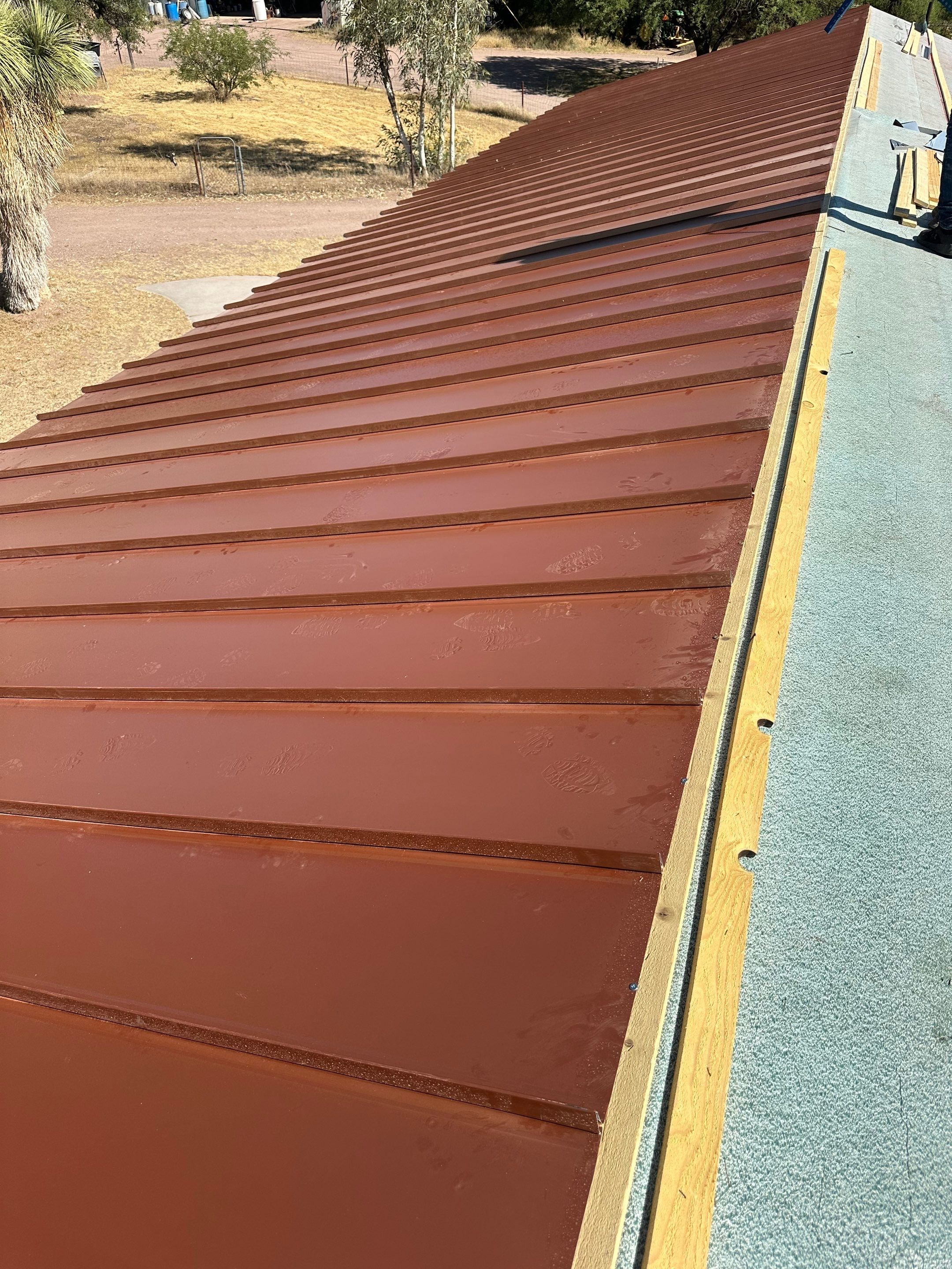 Bronze Standing Seam by Reimagine Roofing
