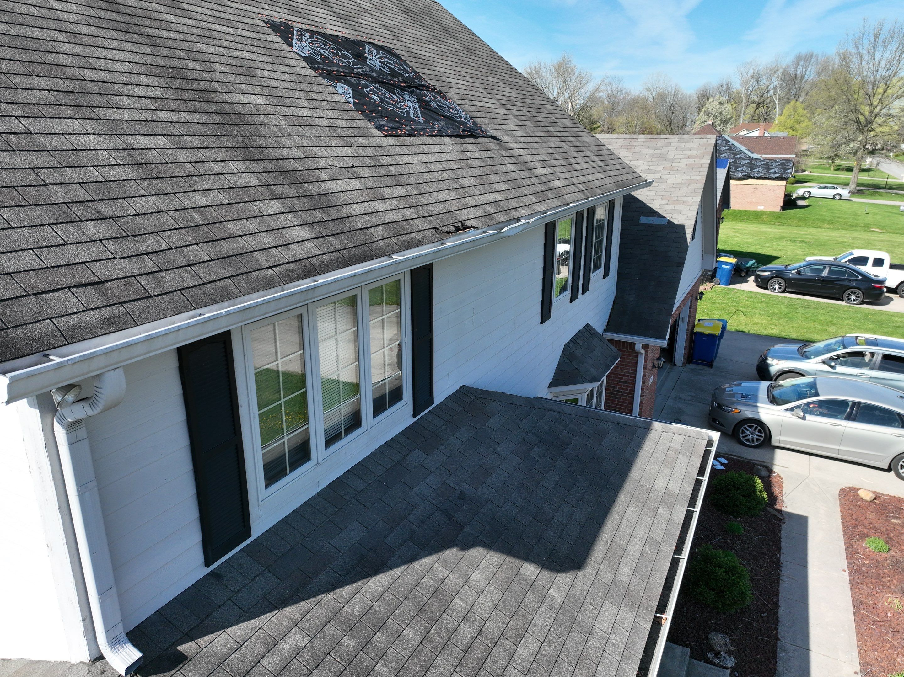 Tornado damage in Whiteland. Roof replacement, James Hardie siding, exterior paint, gutters, windows, doors by 317 Roofing & Restorations