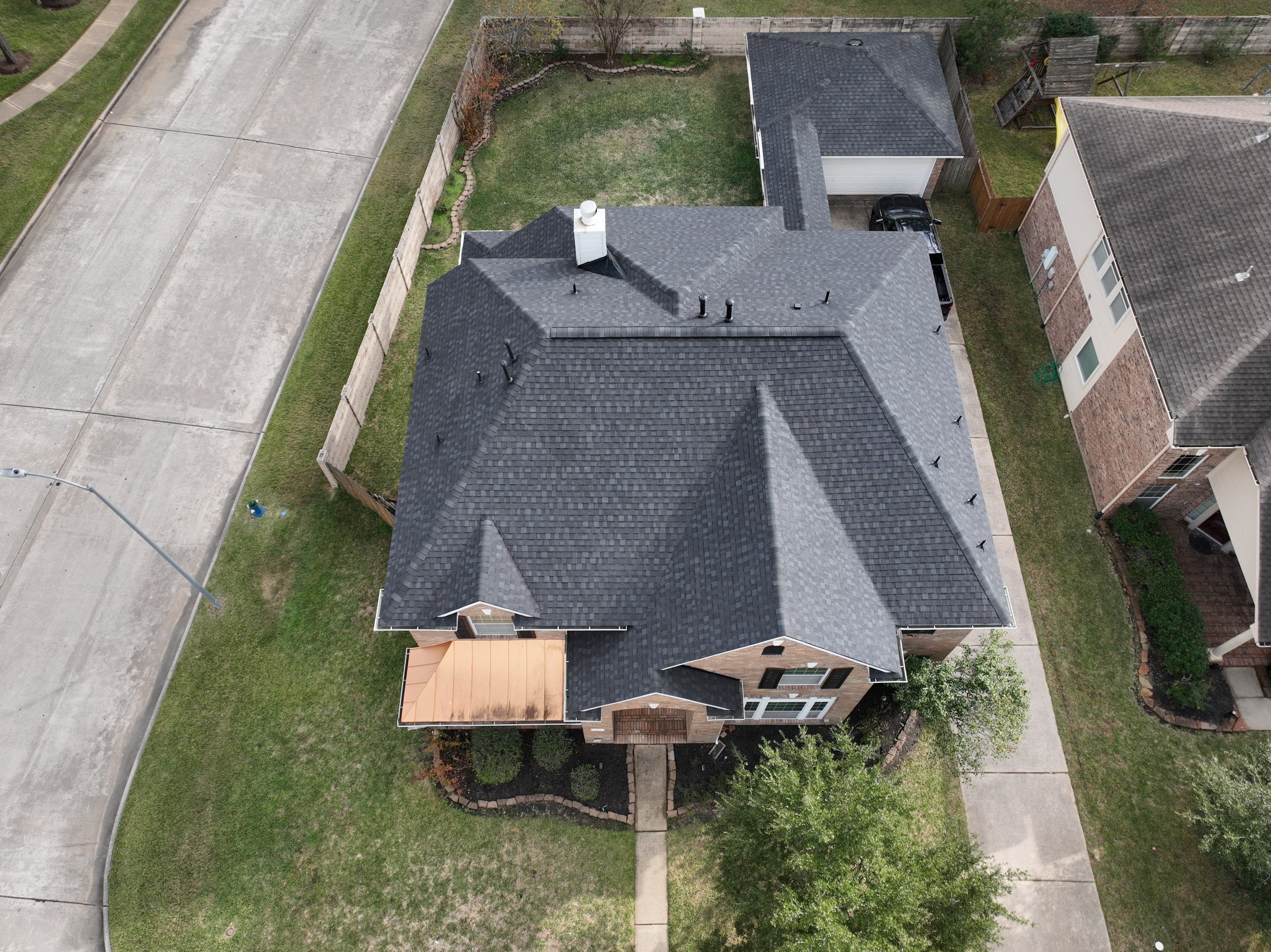 Tamko Titan XT - Rustic Black by Roof Concepts Construction