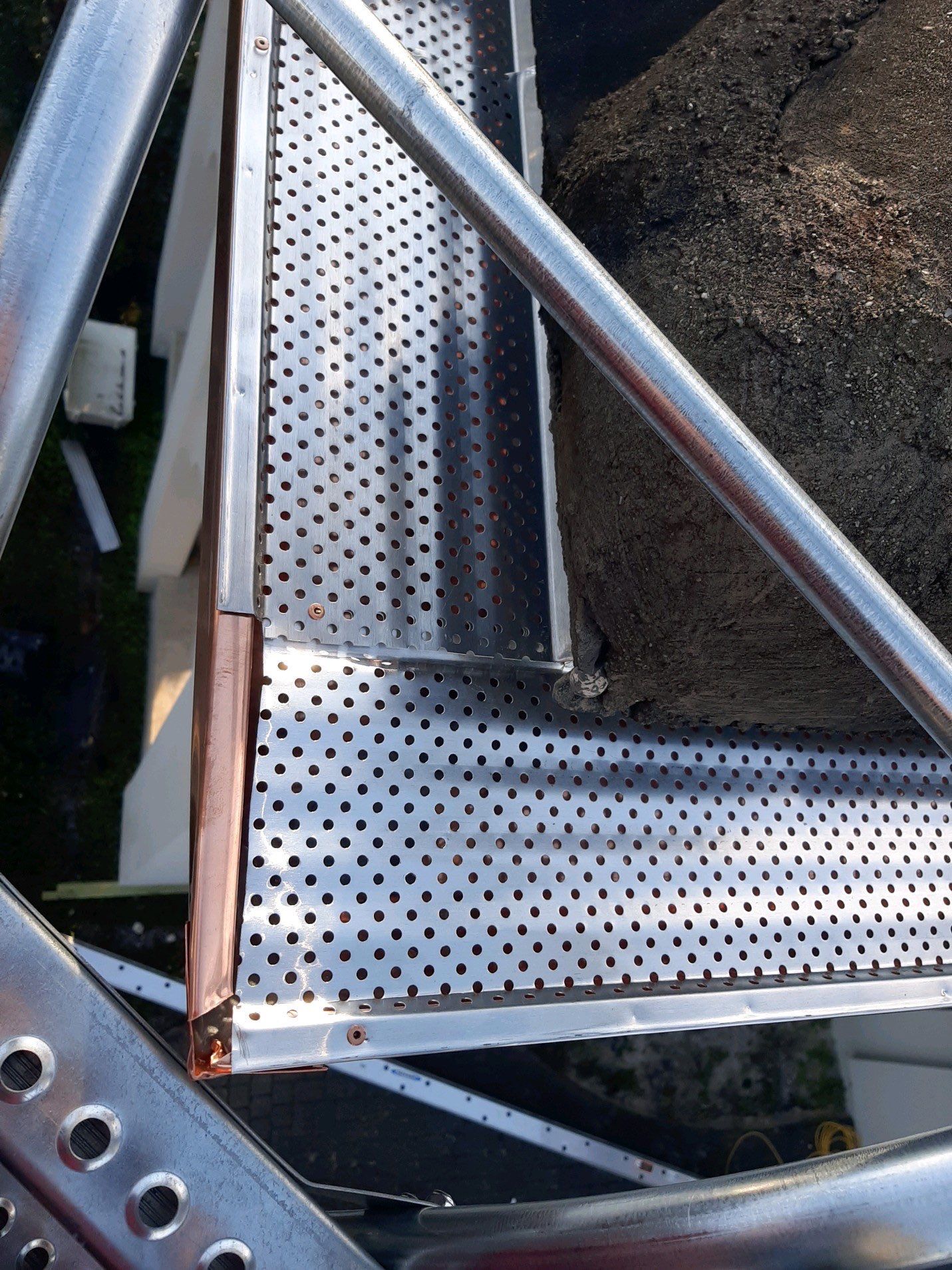 Seamless Gutter Installation Using Copper K- Style Gutters by Gutter Professors