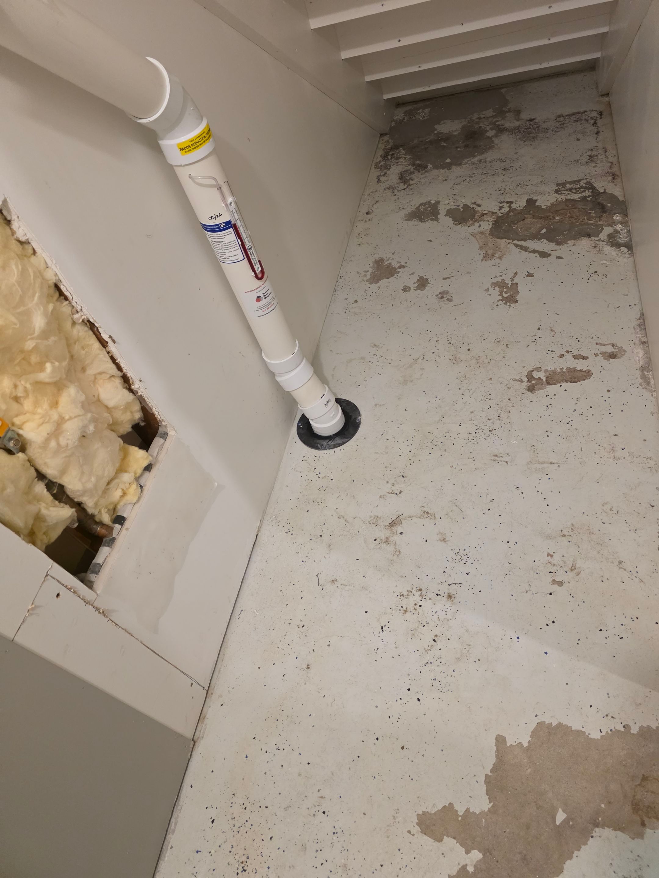 Full Garage and Basement Epoxy Floor Coating in Winner by Select Painting, Coatings & Garage Cabinets