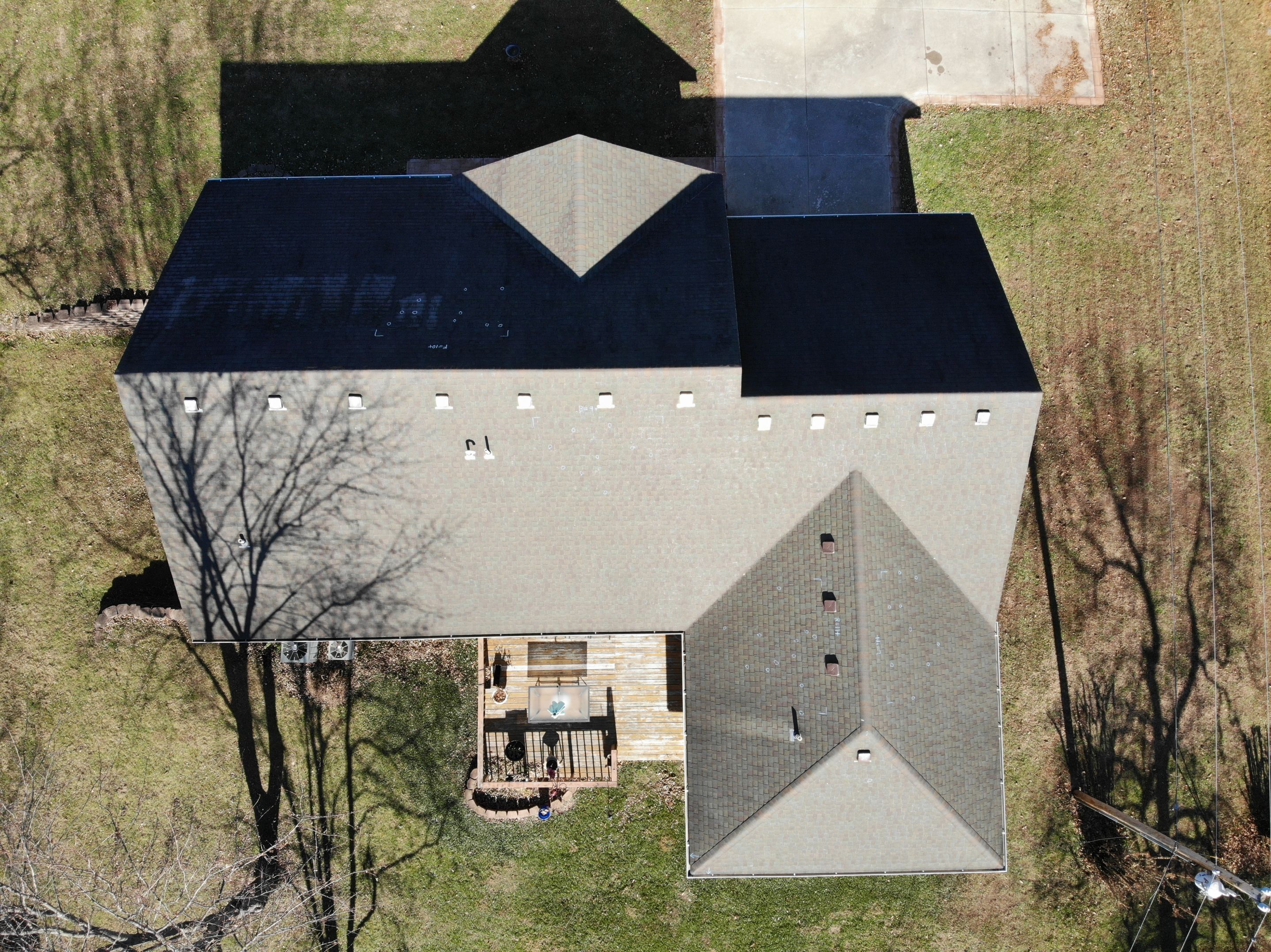 Residential Roofing Install - Green Atlas Pinnacle Pristine Shingles - White Gutters & Downspouts by Titan Commercial & Residential Roofing