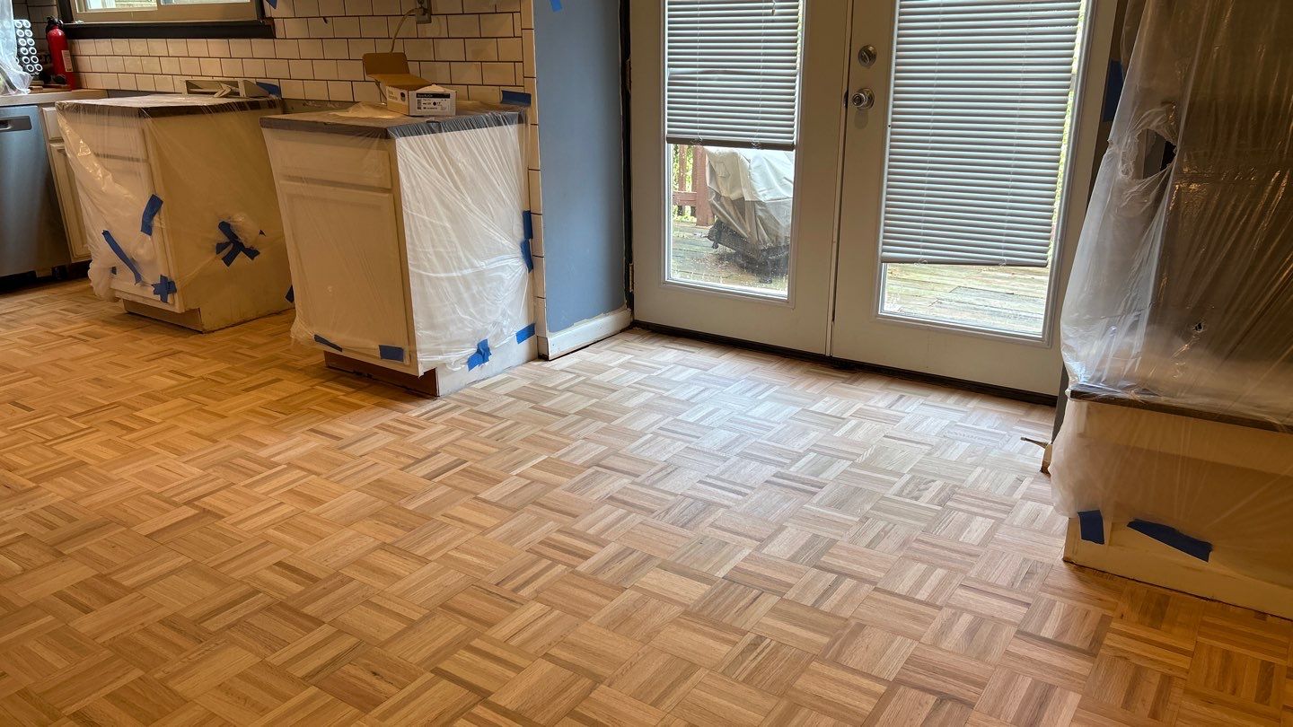 Parquet floor and stair treads by Footprints Floors of Nashville