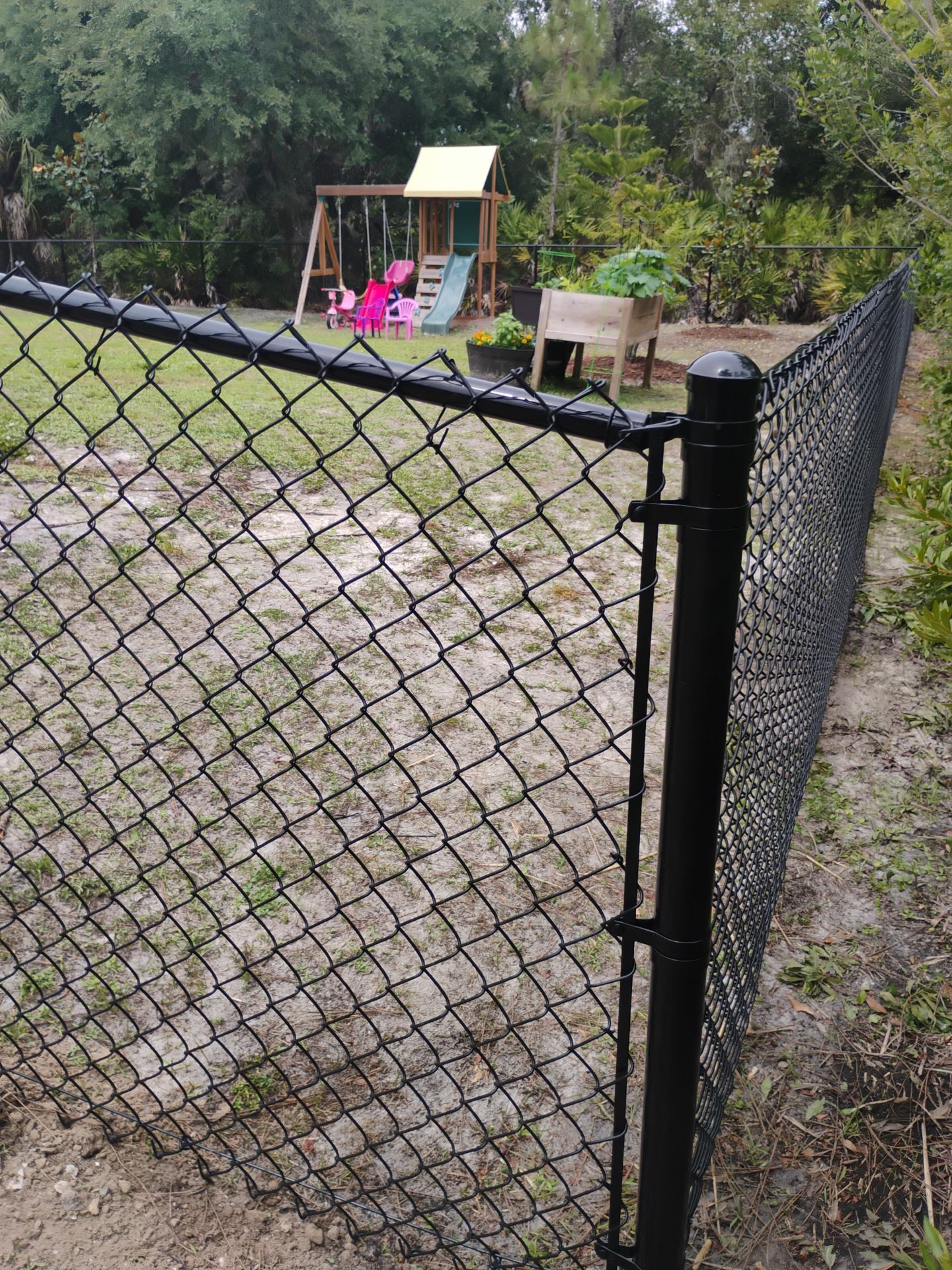 Residential Black Chain-Link Fence Installation in North Port by True Fence LLC