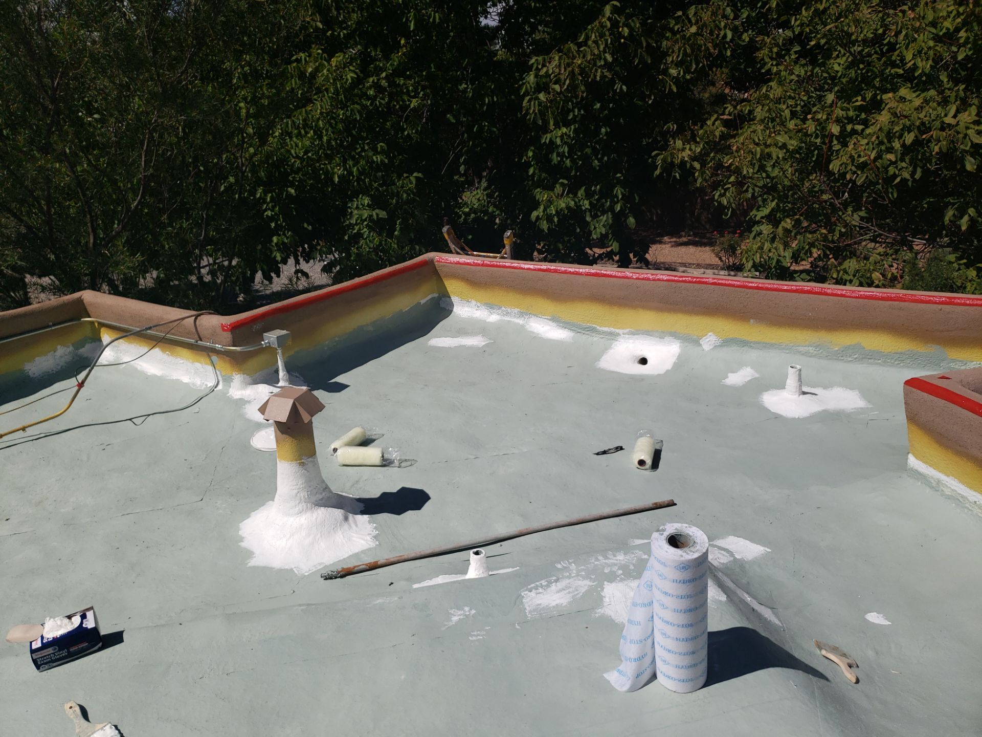 Residential roof application by SPF Services 