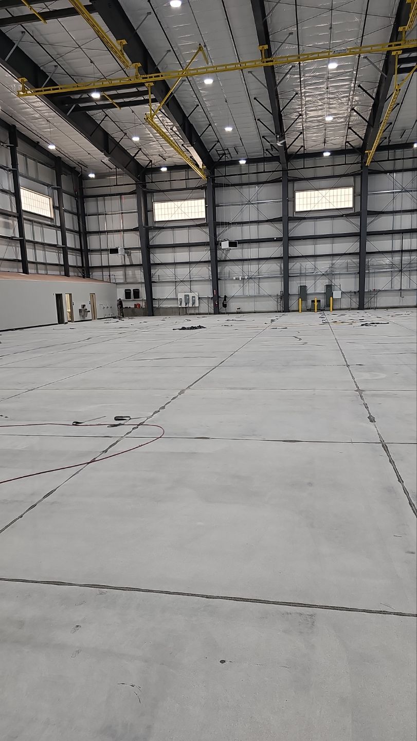 Airplane Hanger using Light Grey Commercial Penntek Epoxy by Croc Coatings, LLC