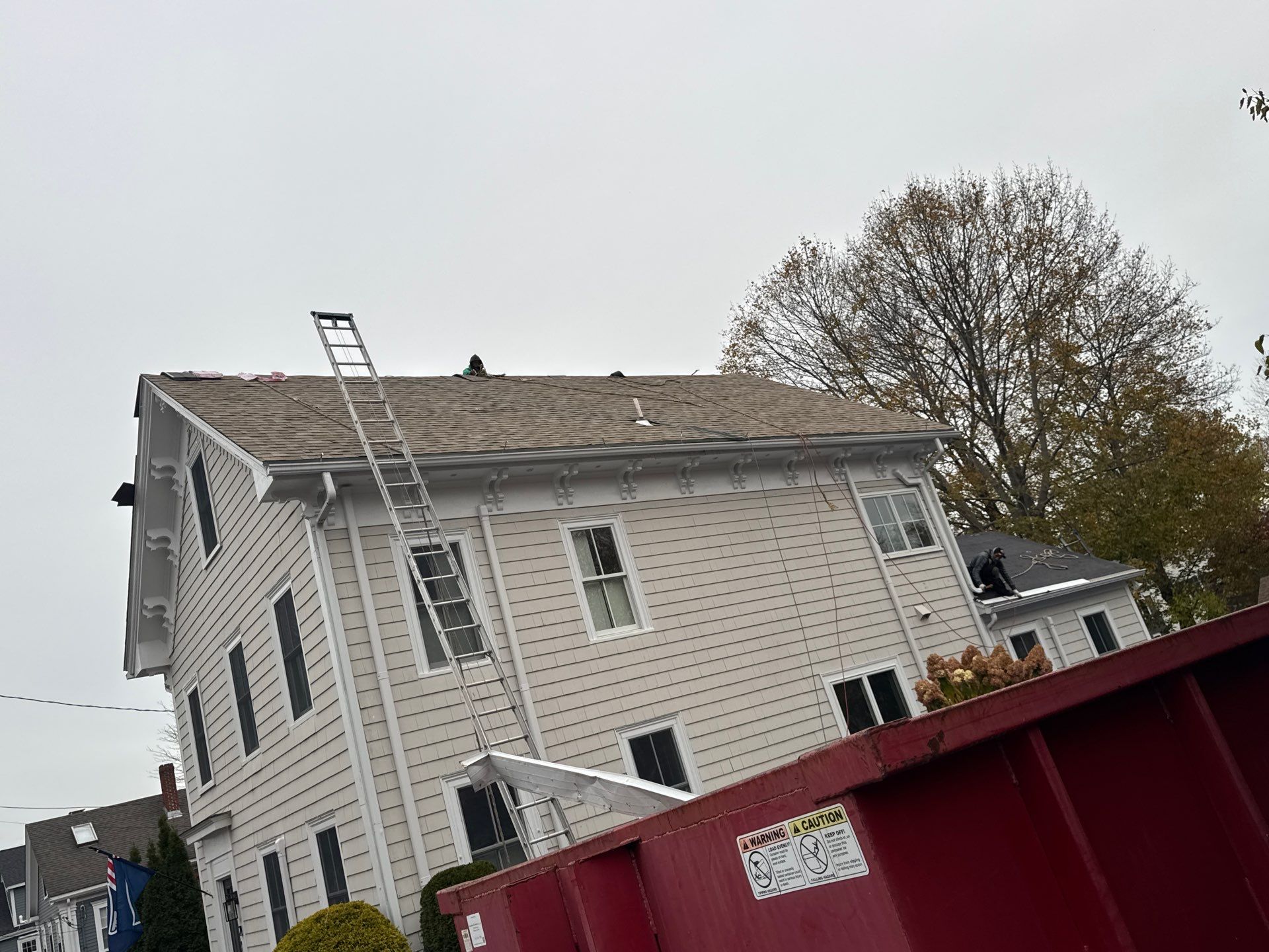 Newburyport Complete Roof Replacement with Solar Venting Skylight by Mighty Dog Roofing of Greater Middlesex County