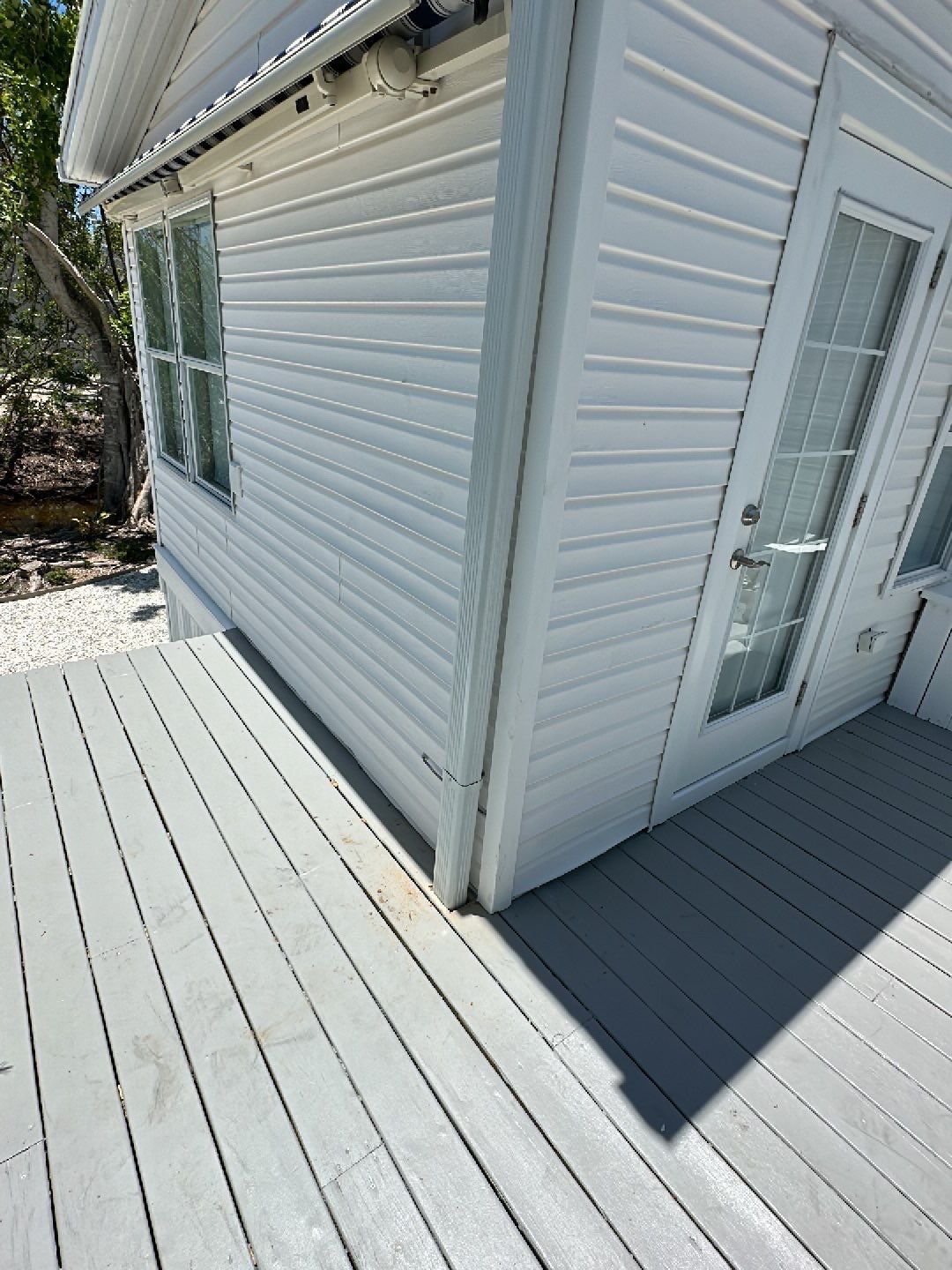 Downspout Installation using Charcoal Grey in Sanibel FL by Gutter Professors