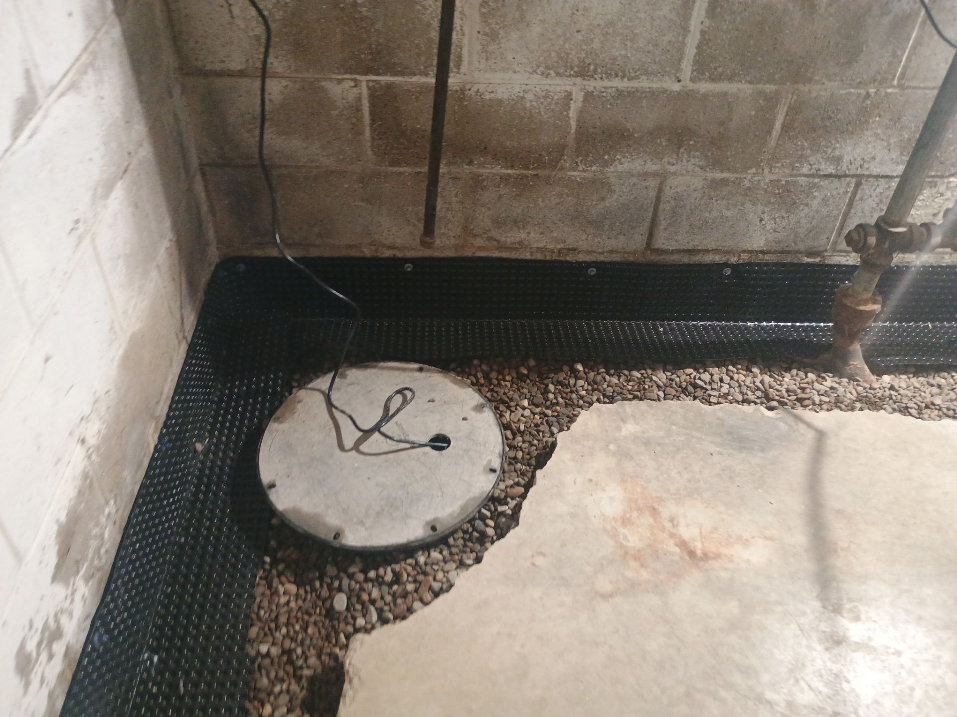 Interior Drain Tile Installation near Columbia Heights, MN by Waterproofing Northeast