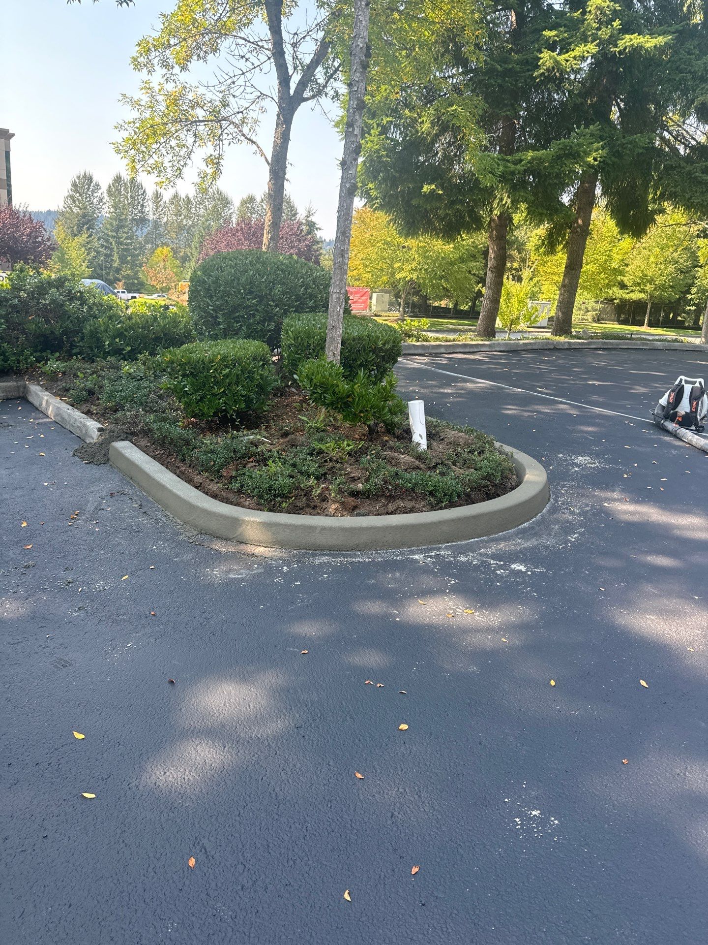 Kidder Matthews | Parking Lot Sealcoating & Striping with Concrete Curb & Patch Repairs  by Jireh Asphalt & Concrete Inc 