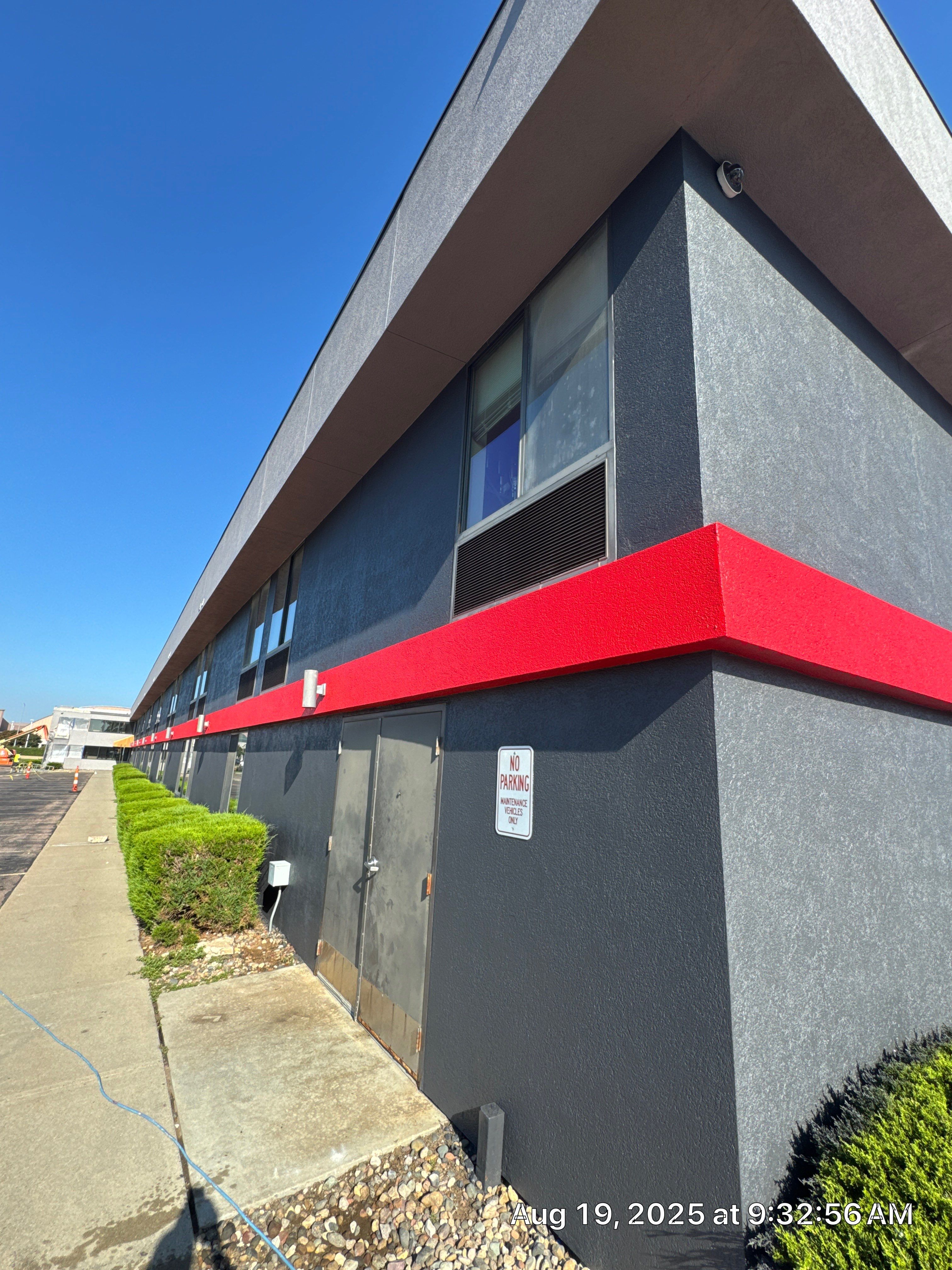 Commercial Exterior Painting with Stucco and Bold Red Accent Trim by Select Painting, Coatings & Garage Cabinets