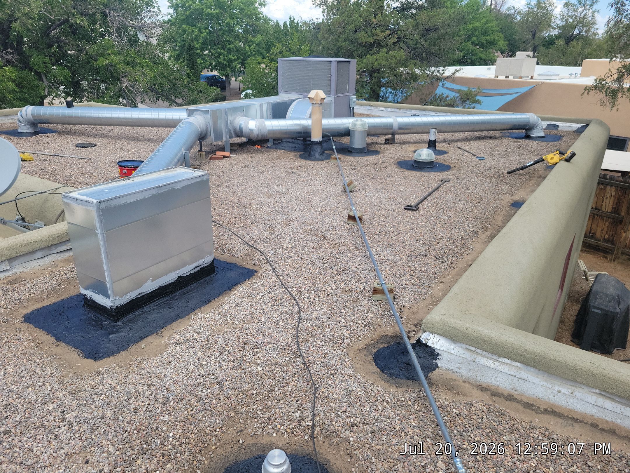 Tar and Gravel Roof Maintenance and Penetration Sealing in Albuquerque by Doyle Roof Masters Inc