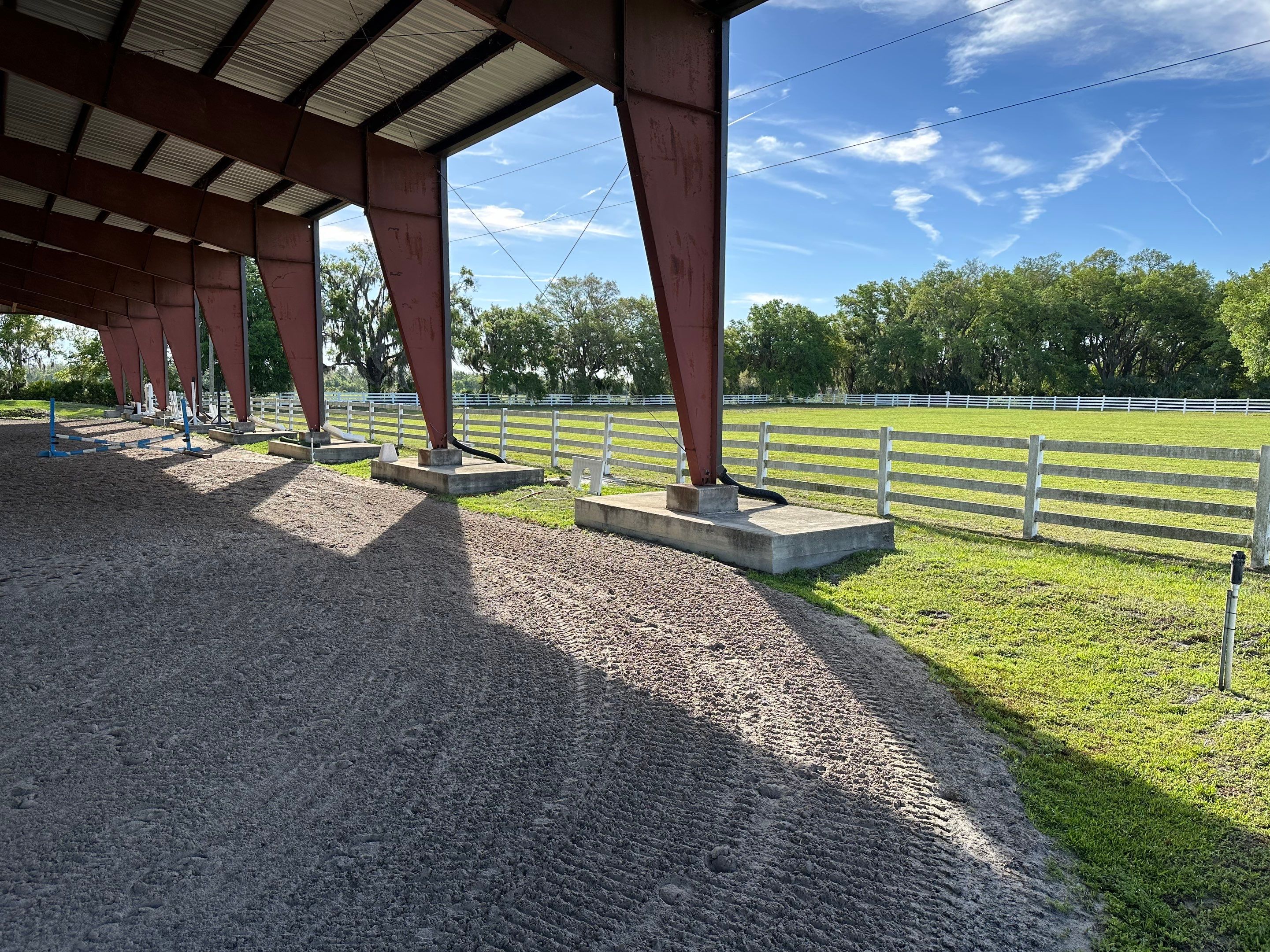 Vinyl Horse Fence & Concrete Pier Cleaning at Lesley Cox Equestrian, Parrish, FL | Sunshine AquaWash by Sunshine AquaWash