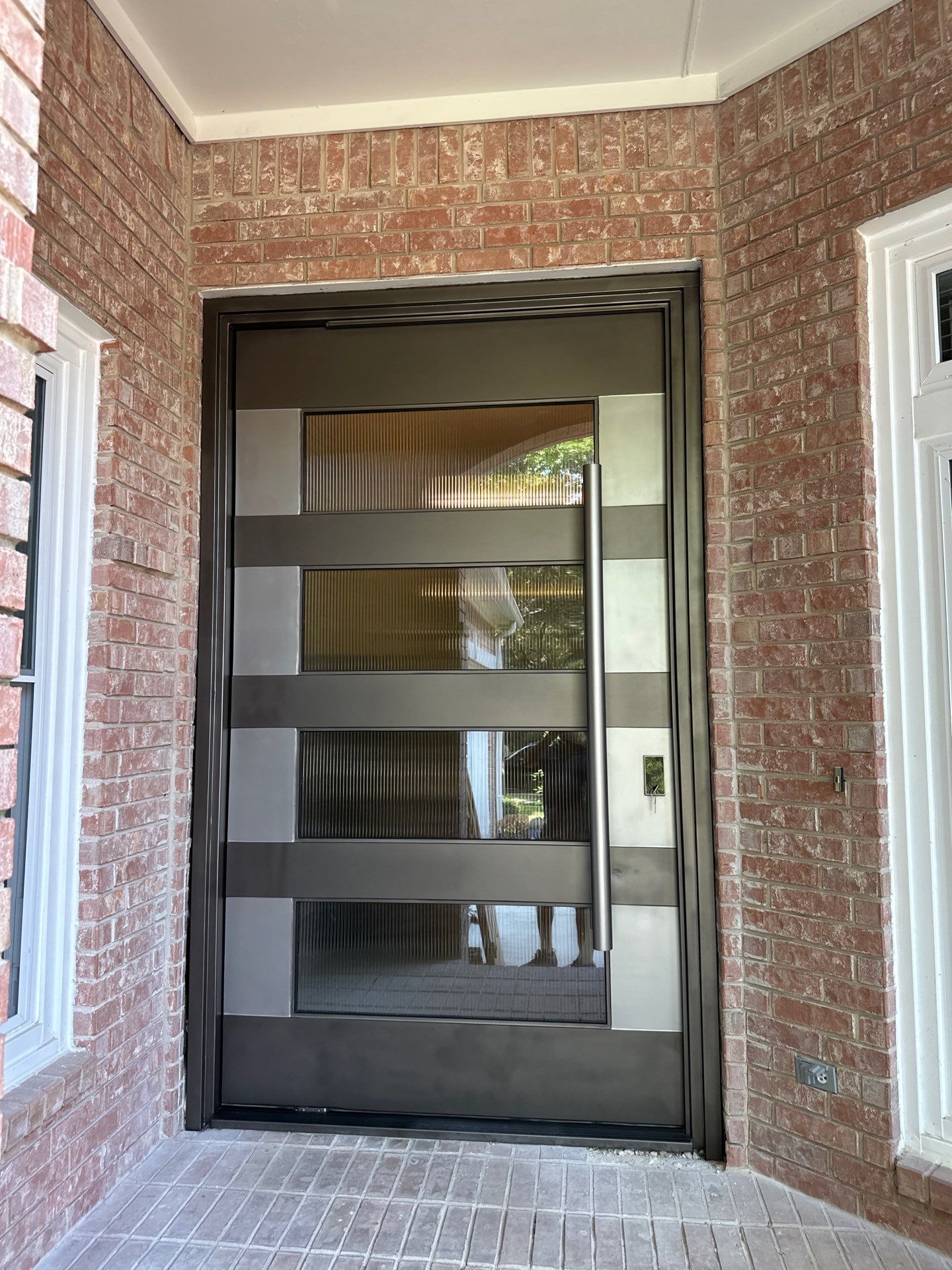 Modern Metal and Glass Entry Door Fabrication and Installation by Solara Custom Living