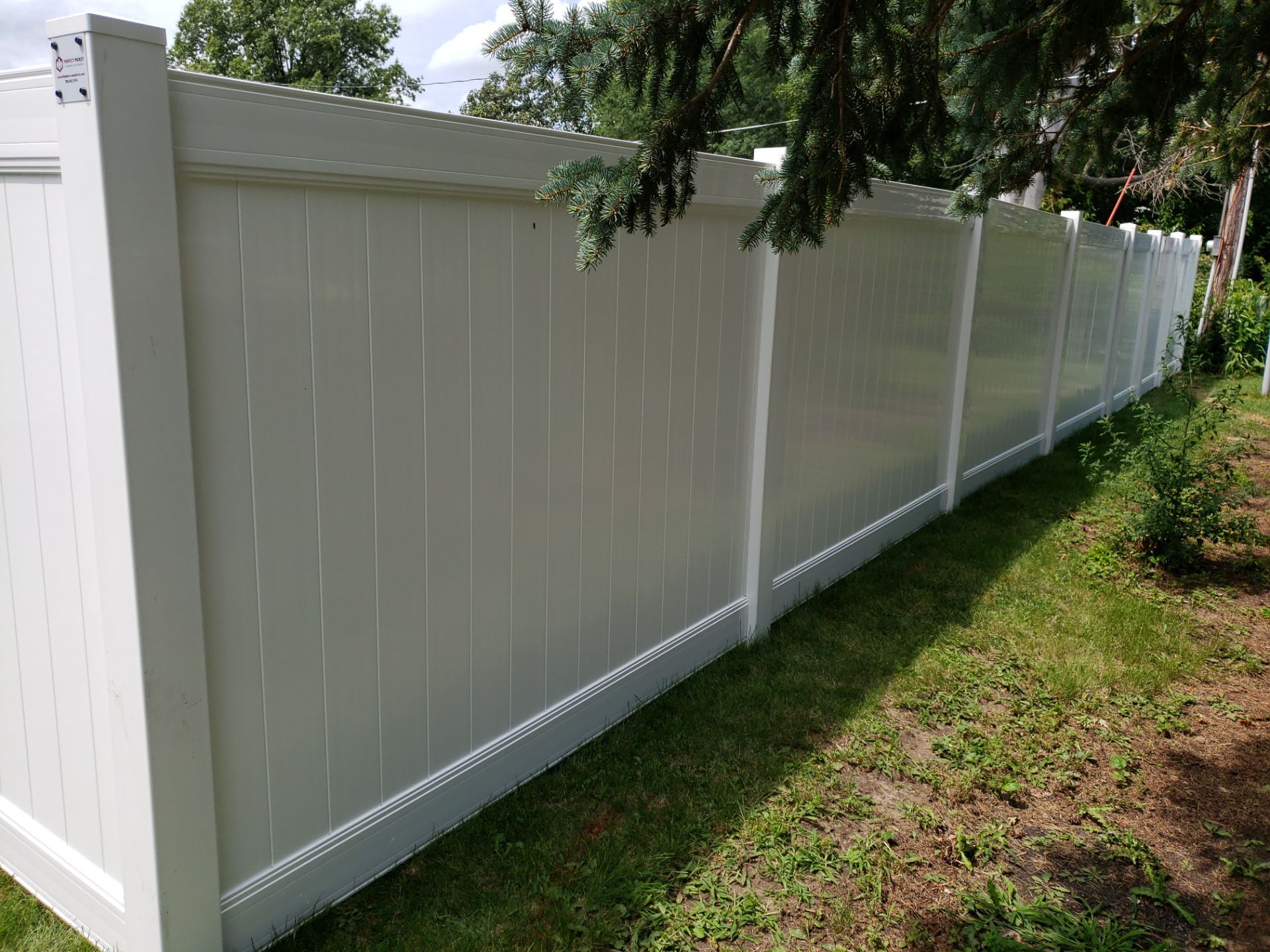White Vinyl Privacy Fence Installation in Grundy Center by Perfect Picket Fence and Stain