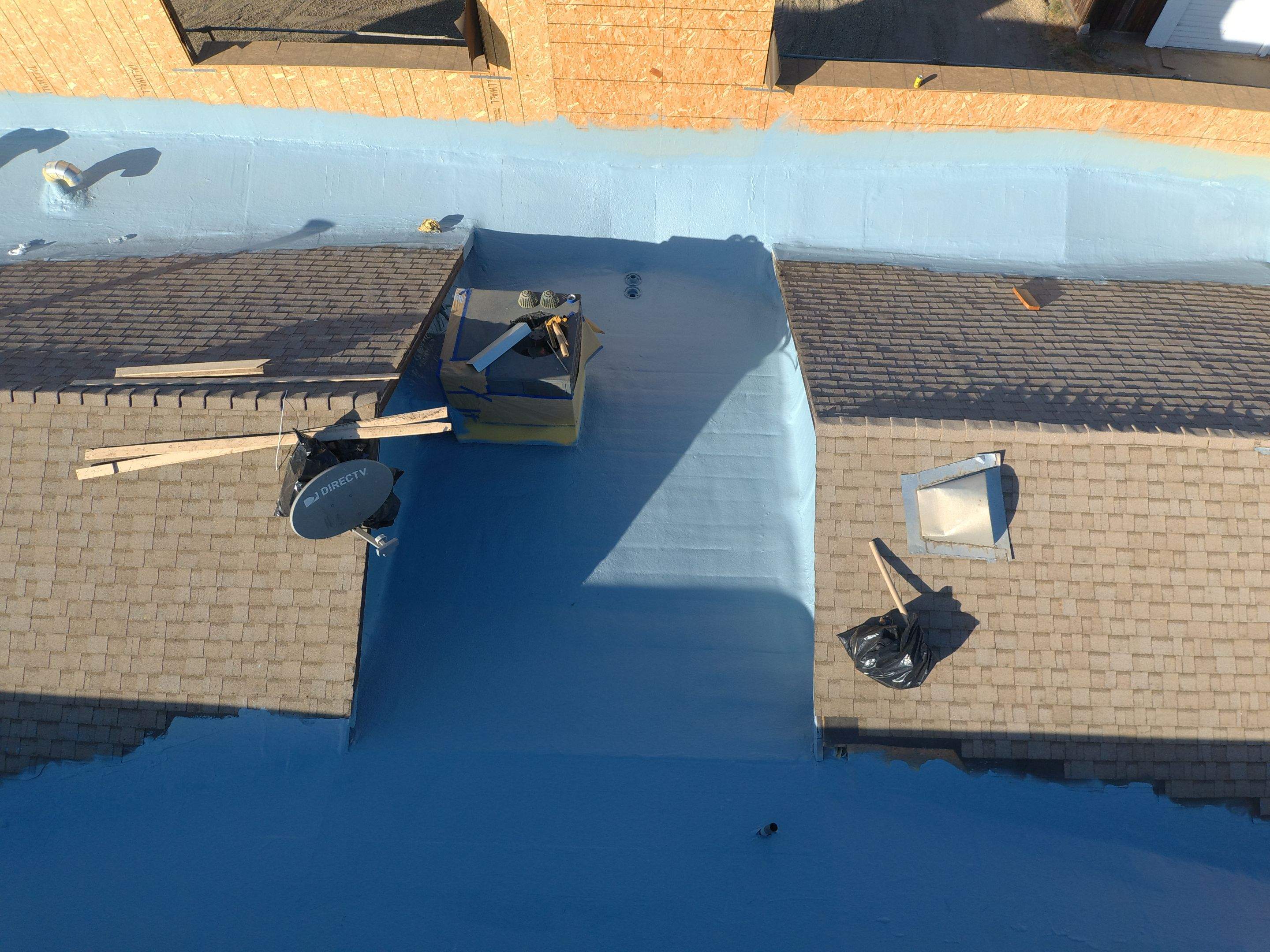 Spray foam and coatings using Conklin Benchmark/PUMA XL coatings and spray foam by Straight Edge Roofing Inc