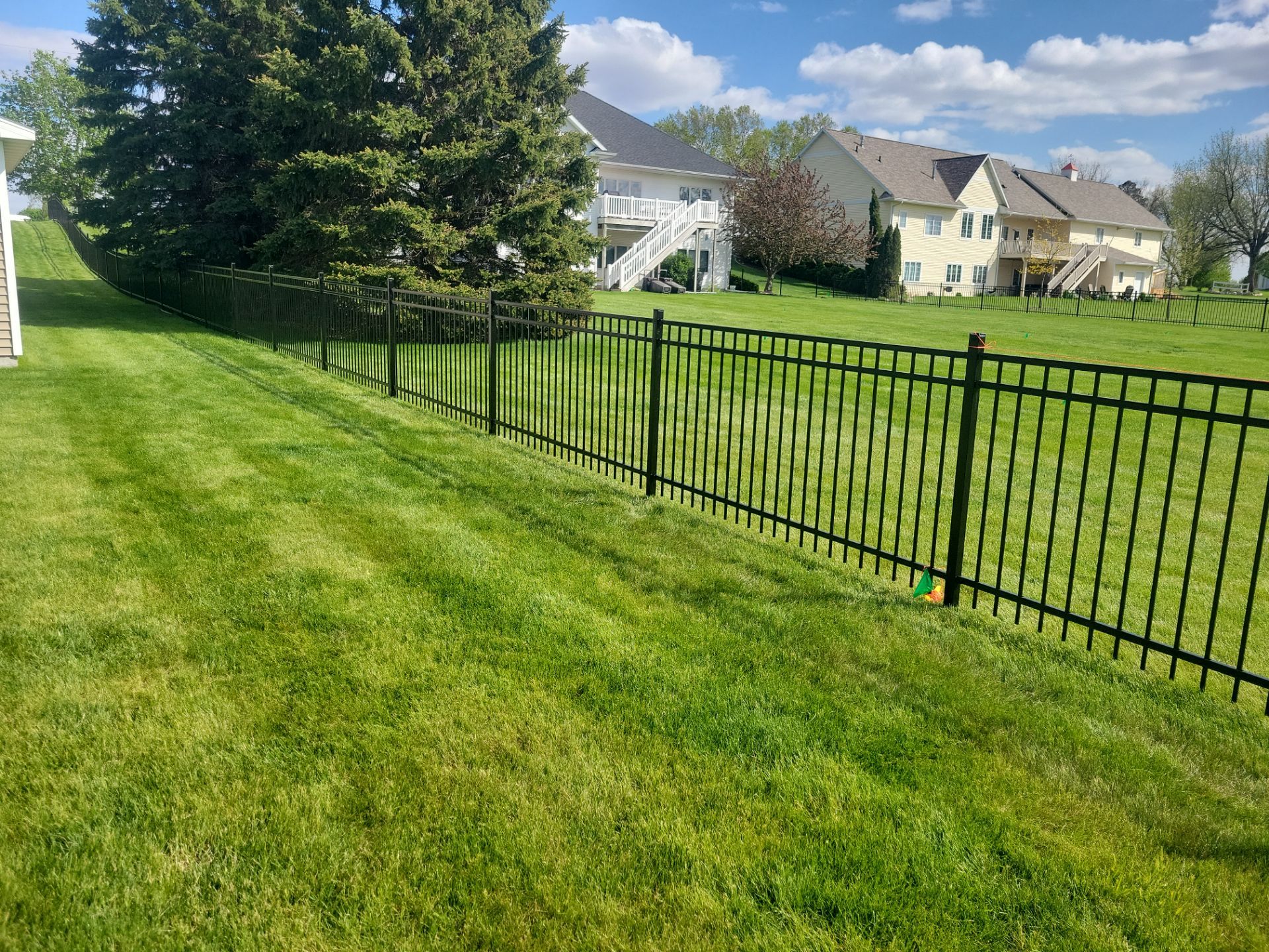 Black Ornamental Metal Picket Fence Installation in Waterloo by Perfect Picket Fence and Stain