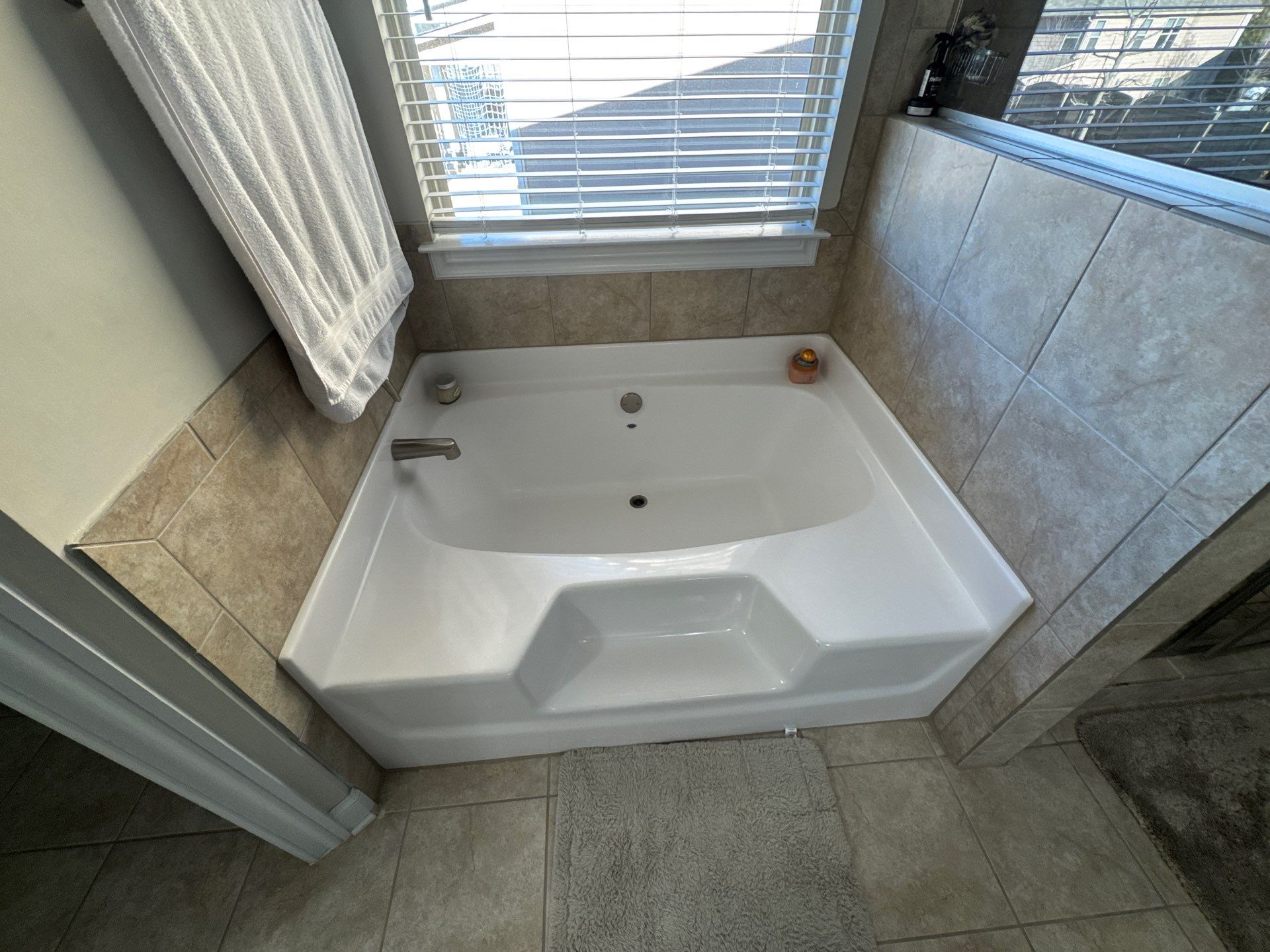 Shower retile and bathroom flooring by Prudencio