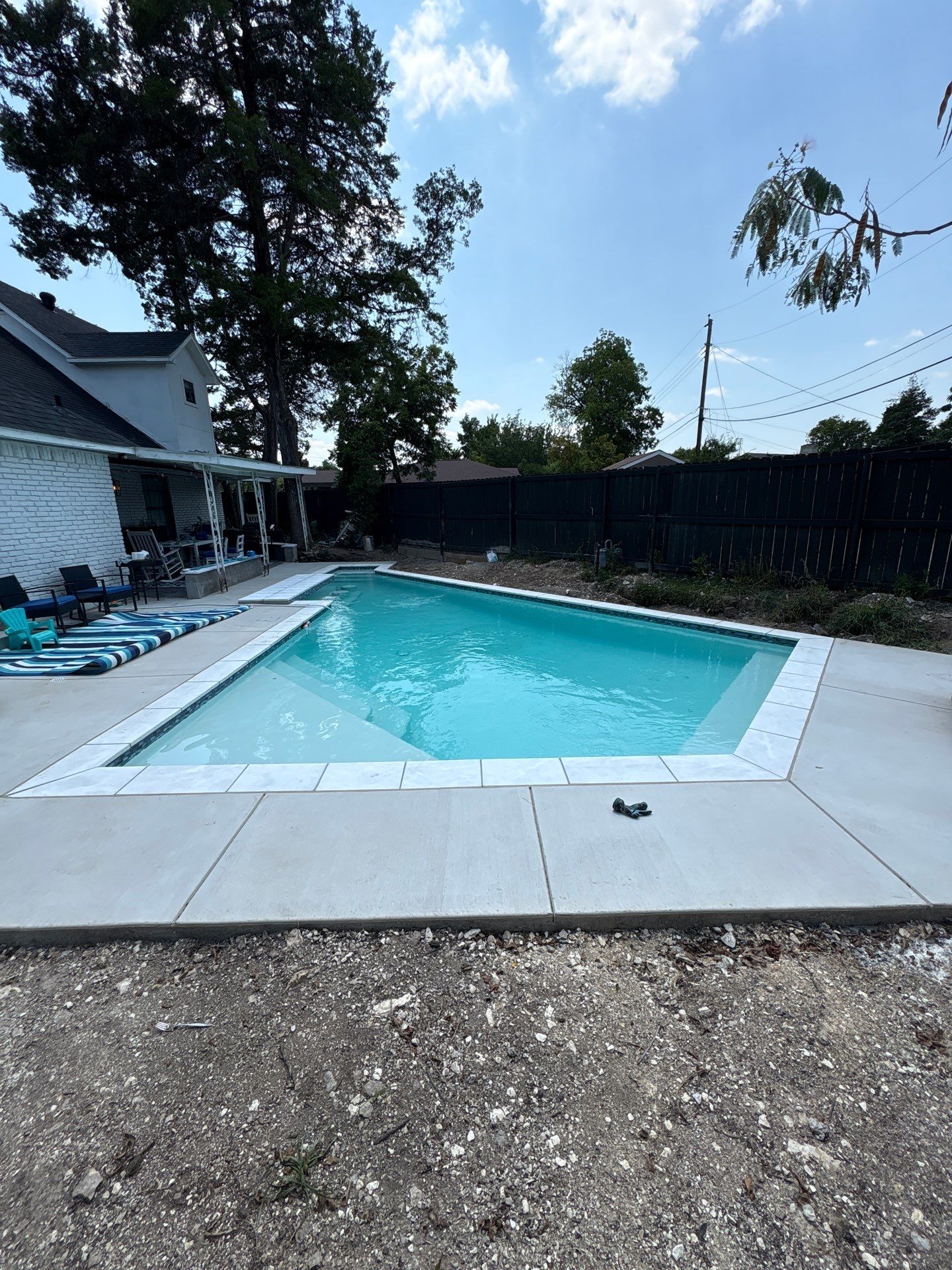 Modern Geometric Pool with Tanning Ledge by Pinnacle Pools and Spas - DFW