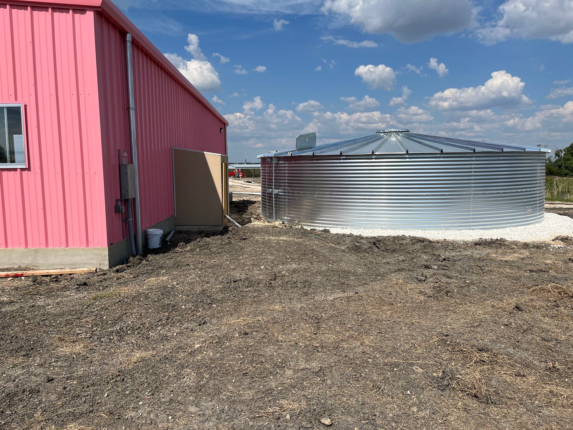 46.4k Commercial Fire Tank-10 degree silo roof with bottle cap topper by Hill Country Rain Water