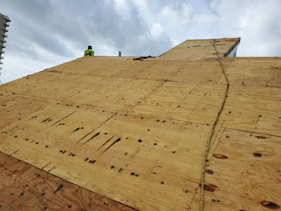 Commercial Roofing Installation using Metal roofing by American Roofing & Construction LLC