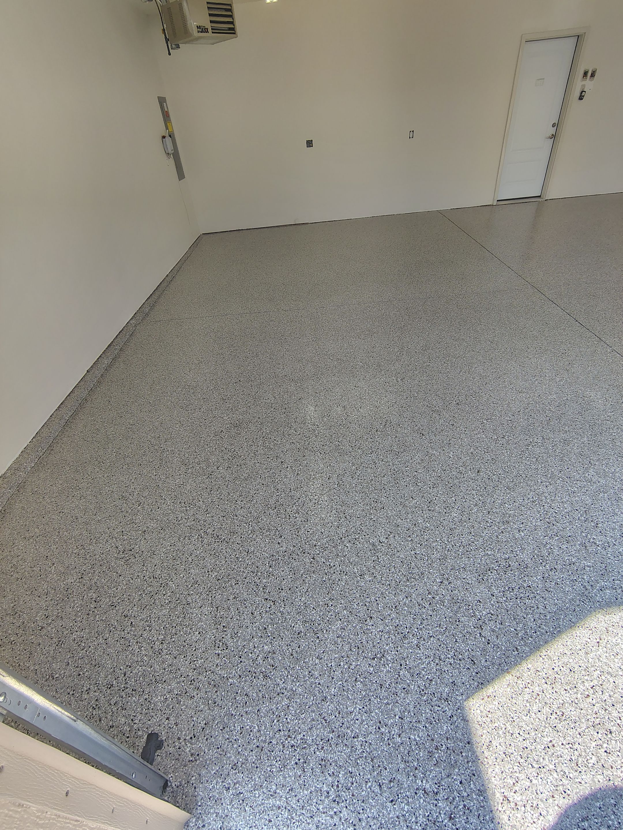 Garage Floor Coating with Coyote Decorative Chip in Tea by Select Painting, Coatings & Garage Cabinets