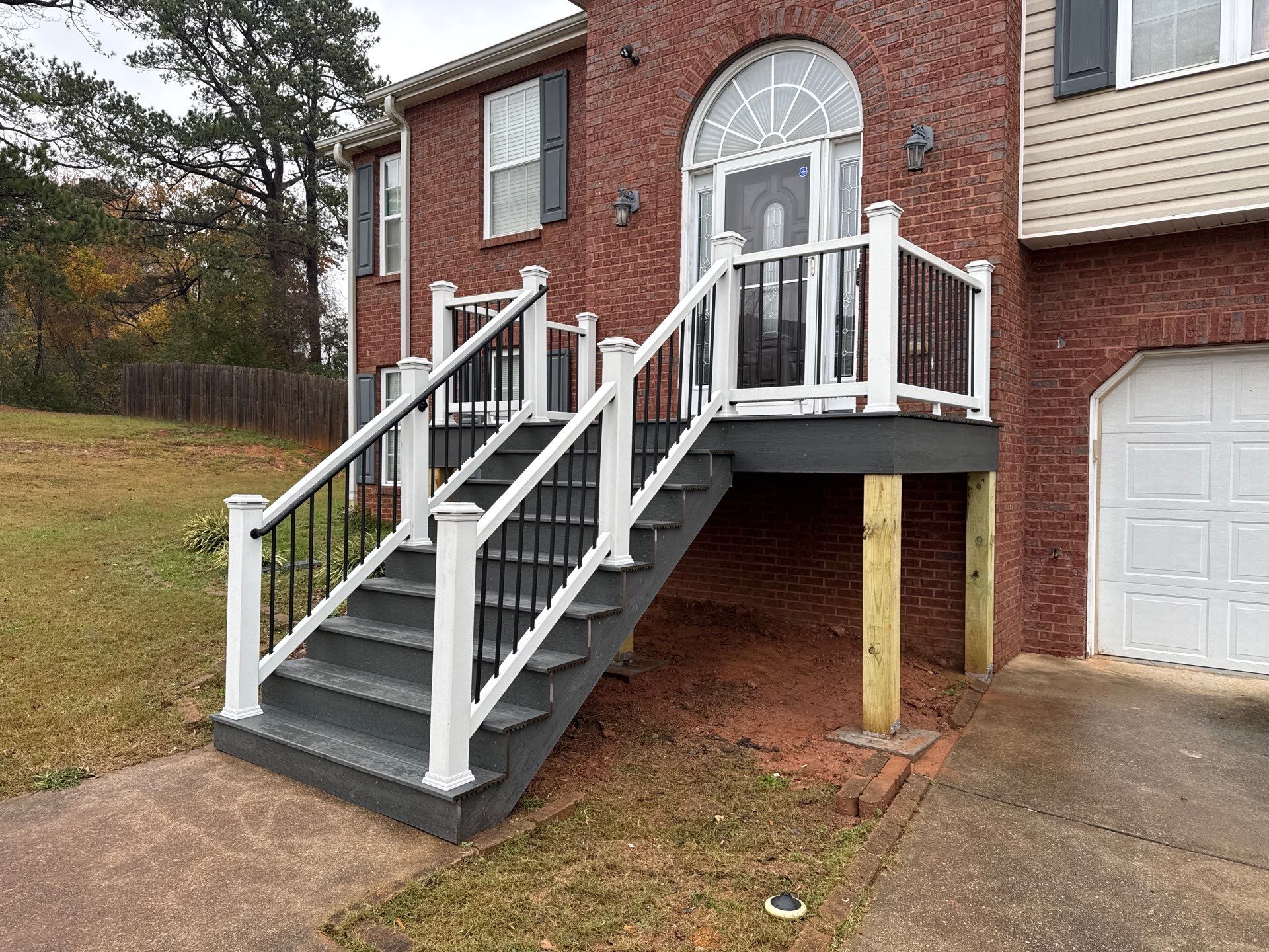 Modern Front Entry Deck and Staircase Renovation in Douglasville by Swift Home Renovations
