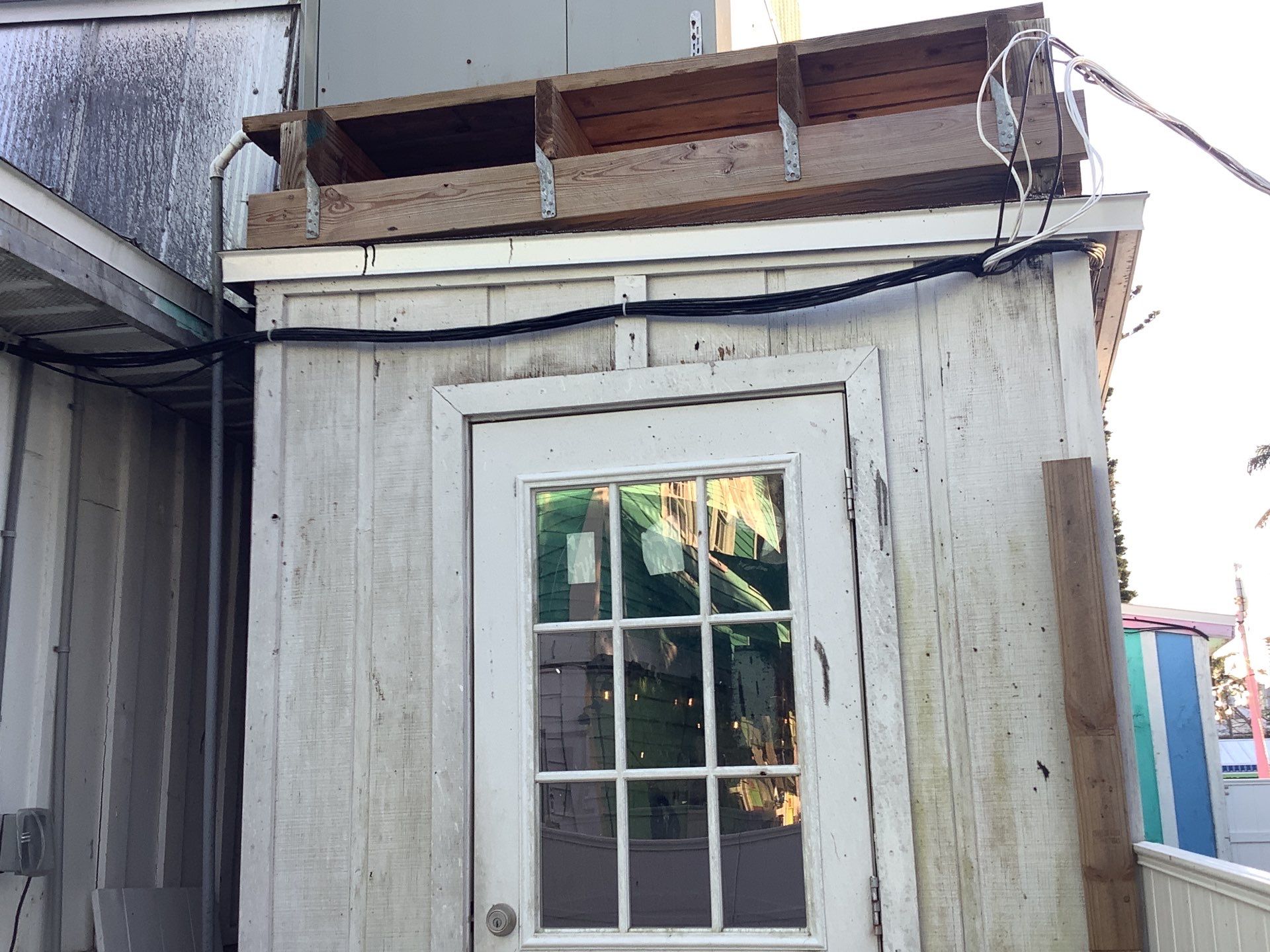 Commercial Downspout Installation in Captiva FL by Gutter Professors