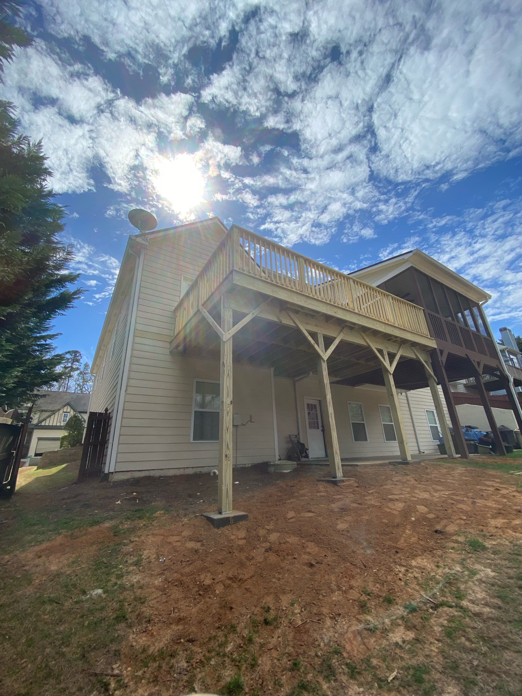 Elevated Pressure-Treated Wood Deck Rebuild in Canton, Georgia by Swift Home Renovations 