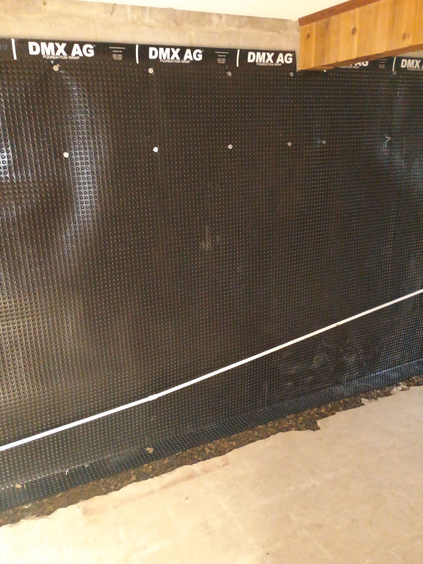 Interior Drain Tile & Foundation Crack Repair in St. Anthony, MN by Waterproofing Northeast