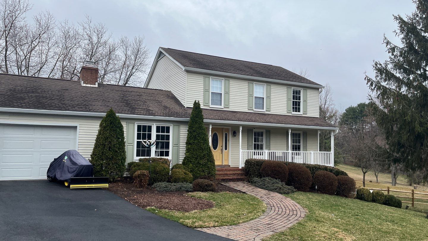Residential Roofing Installation using Atlas Pinnacle Pristine Black Architectural Shingles by Frederick Roof Repair