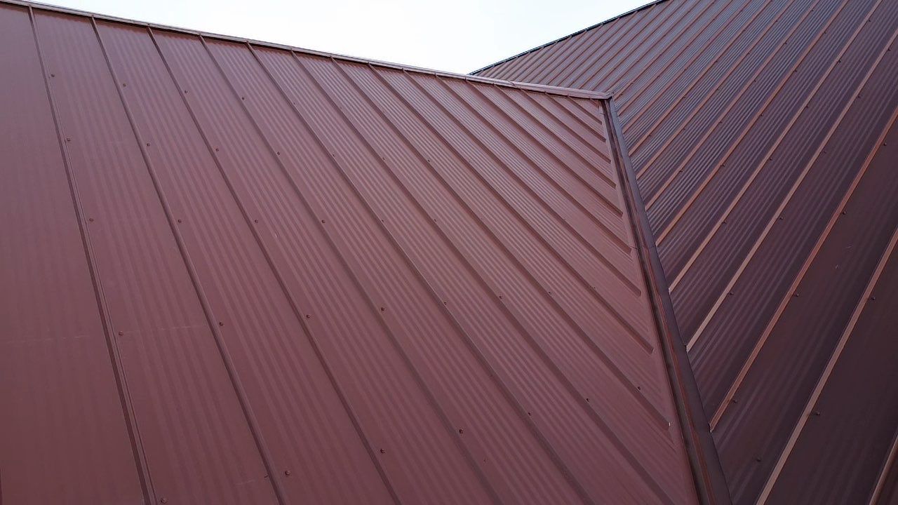 Residential Roofing Install - 26 Gauge M-Rib Metal - Color Brown  by Titan Commercial & Residential Roofing 