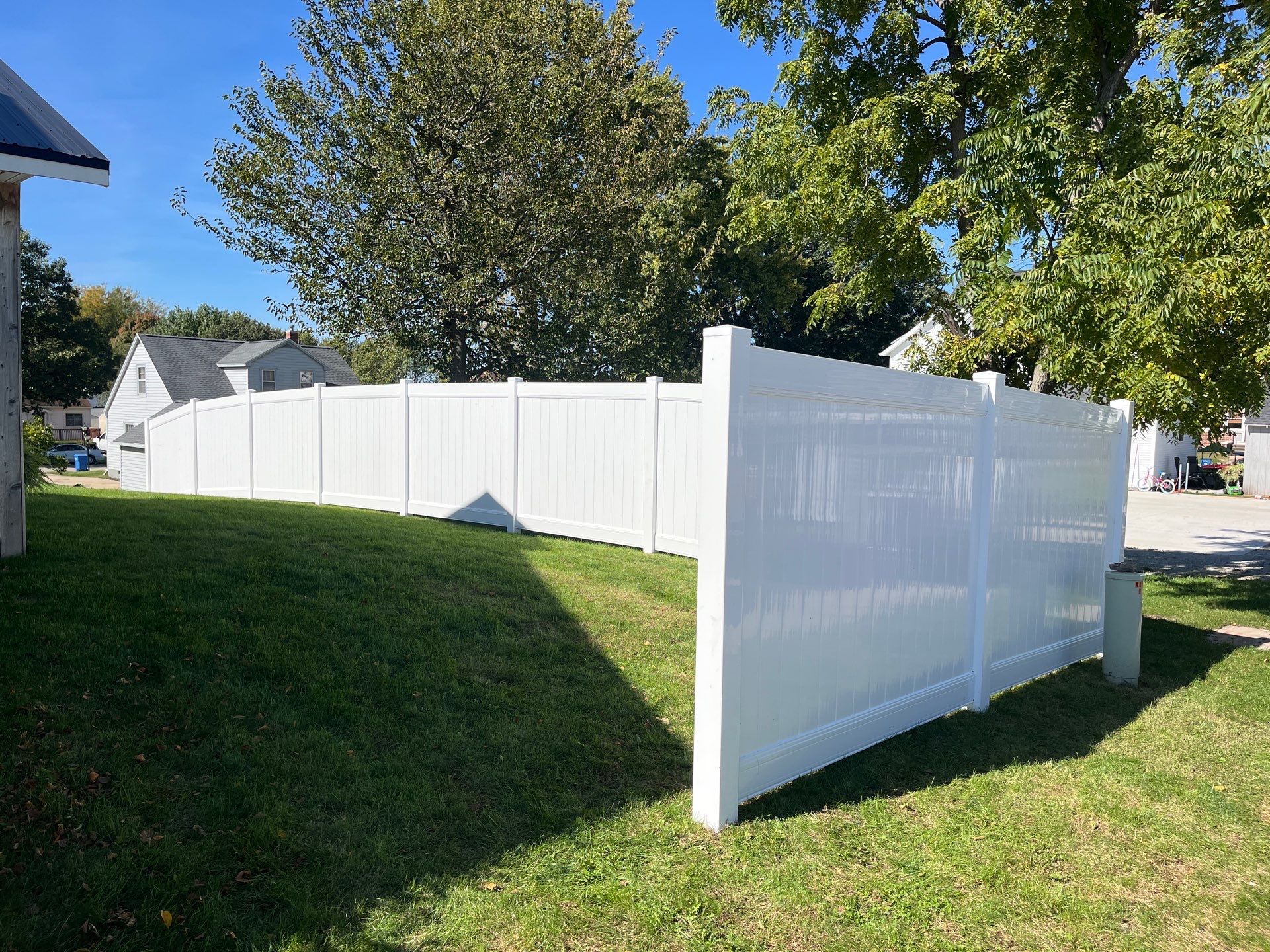 White Vinyl Privacy Fence Installation in Grundy Center by Perfect Picket Fence and Stain