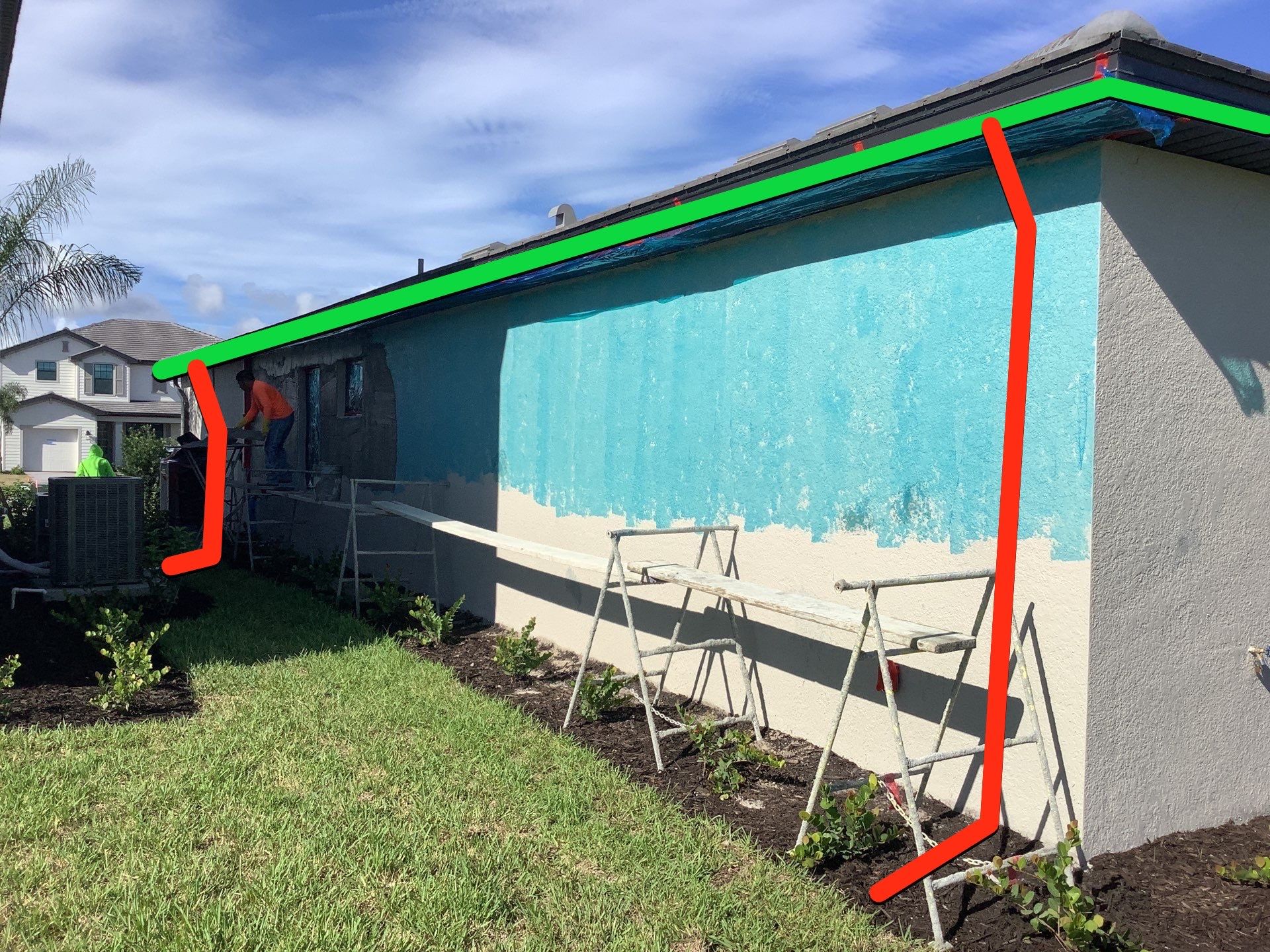 Seamless brown gutter and downspouts installation in Estero, FL  by Gutter Professors