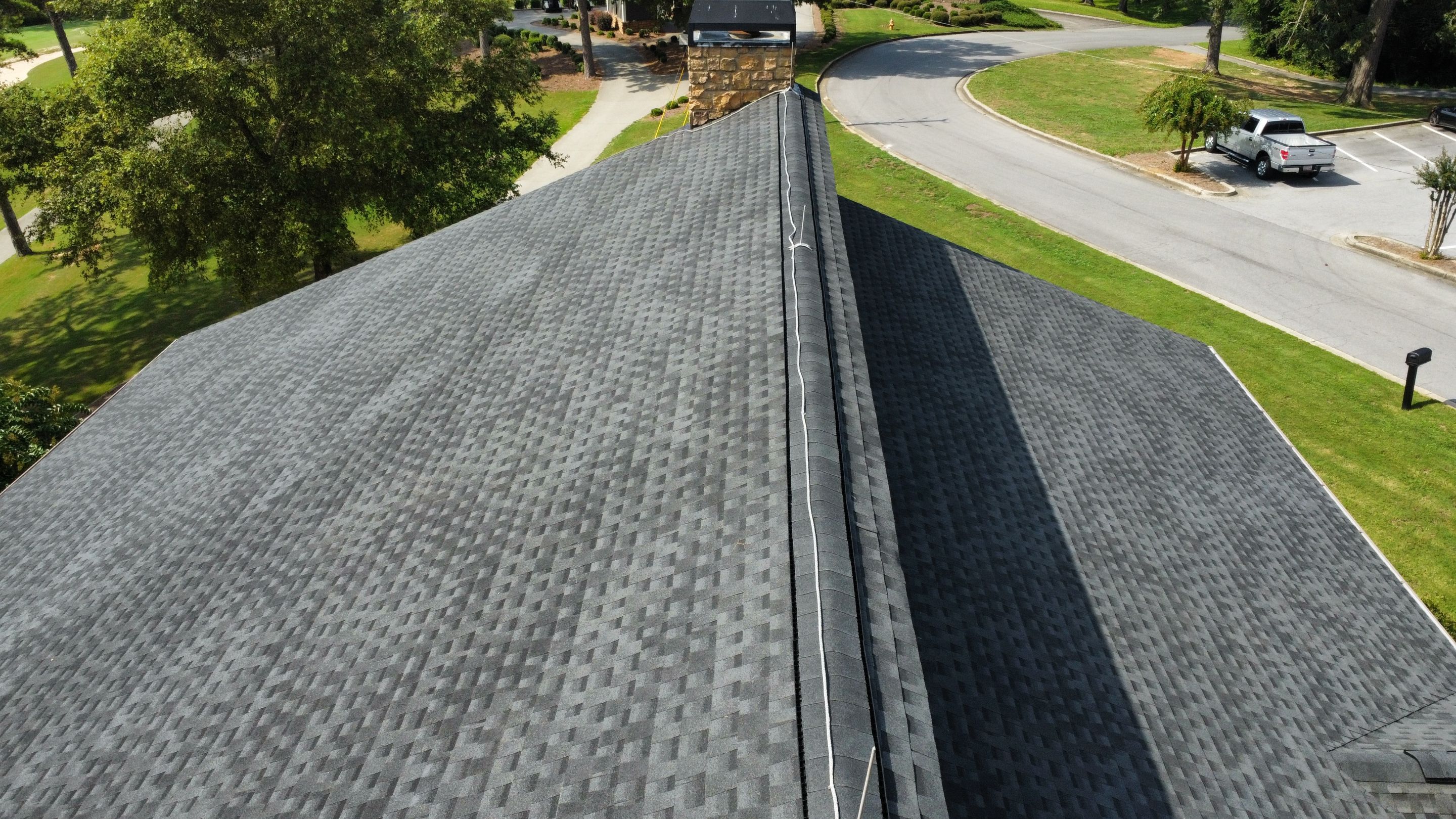 Country Club Roofing Installation by Reset Roofing