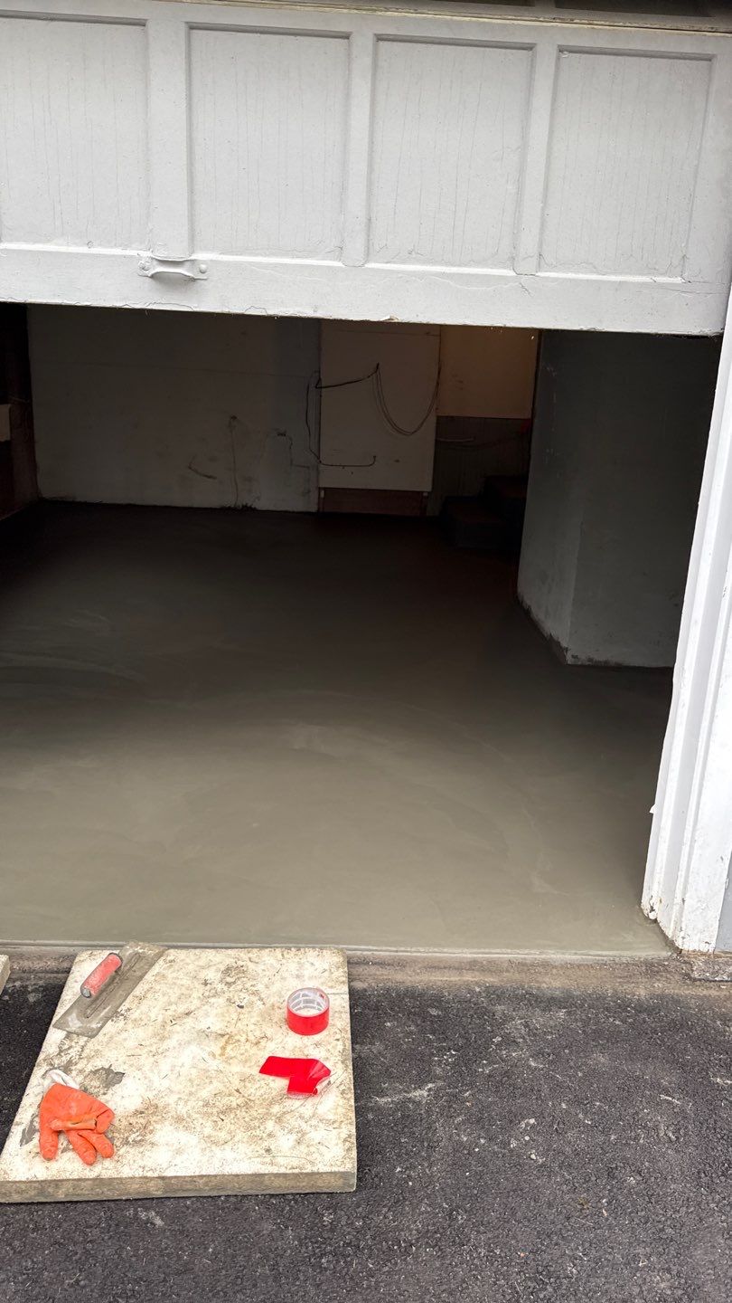 Concrete garage floor replacement  by NG Masonry & Construction LLC