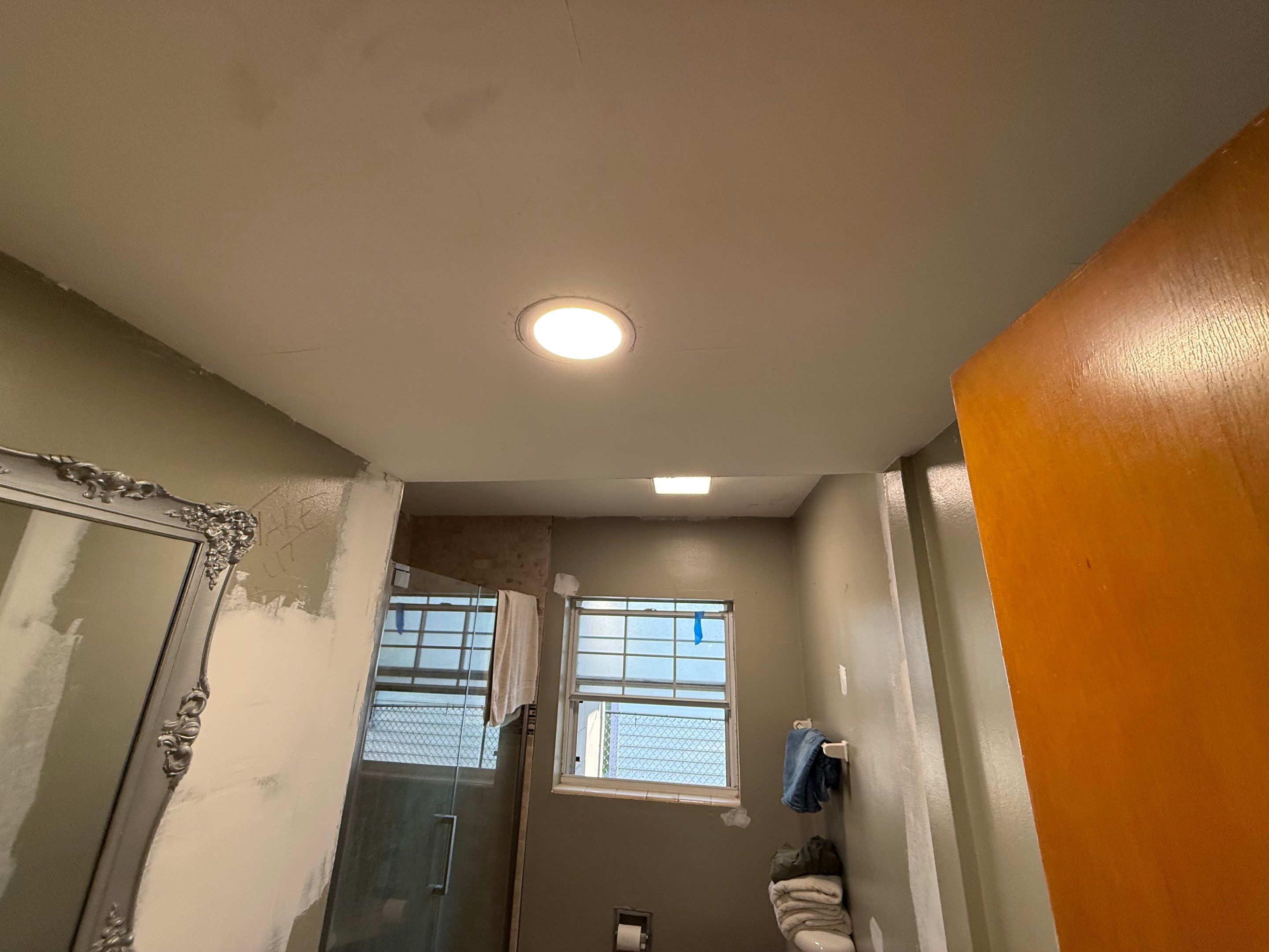 Luxury Bathroom Makeover: Walk-in Shower & Saloon Doors Renovation by urban green energy llc