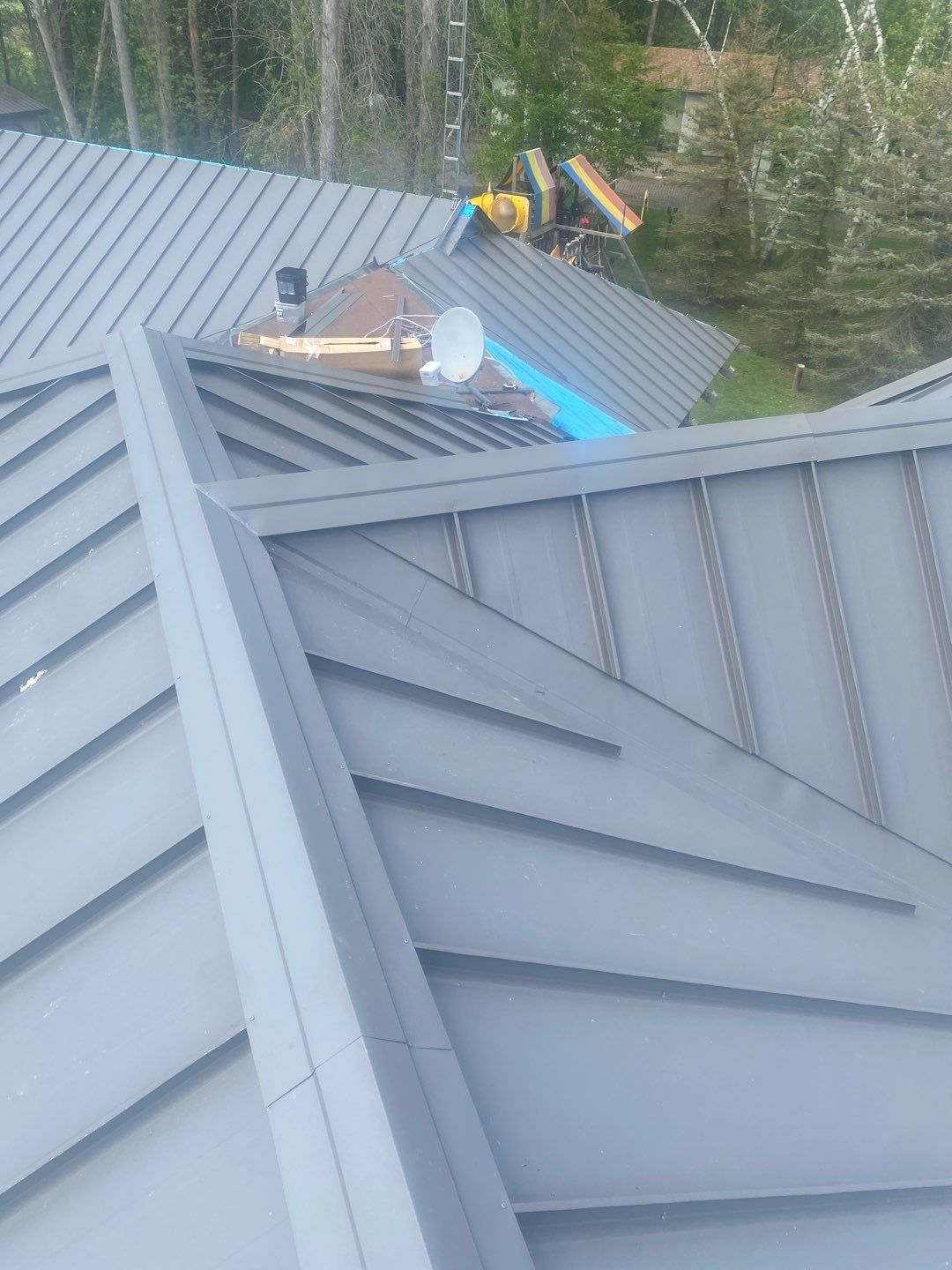 New Roof Installation using 16" Standing Seam Panels by Jay Carter Roofing & Sheet Metal