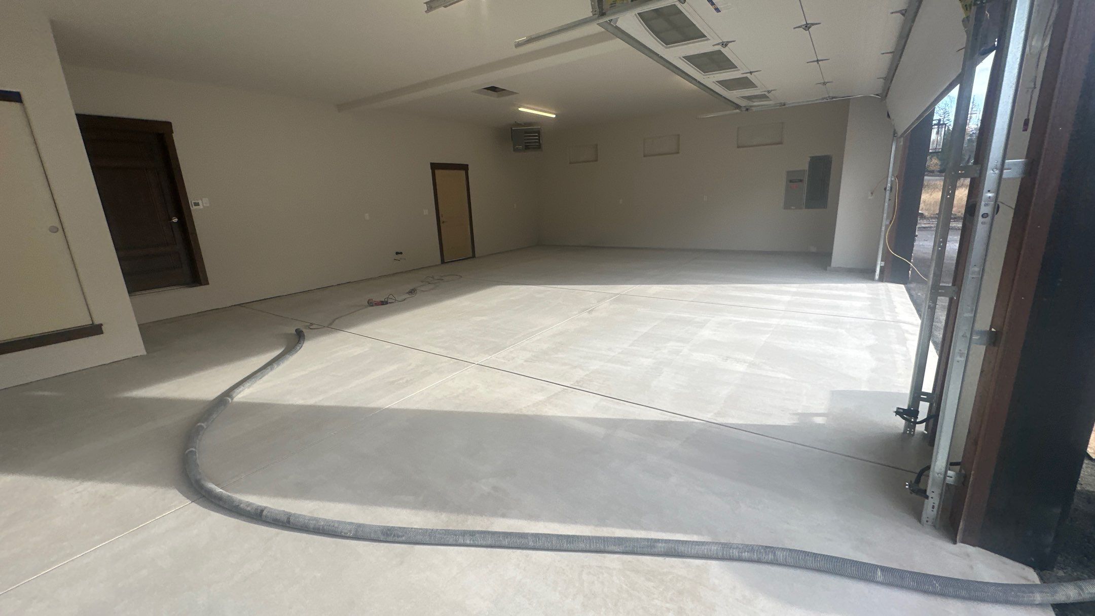Garage Transformation using Domino by Croc Coatings, LLC