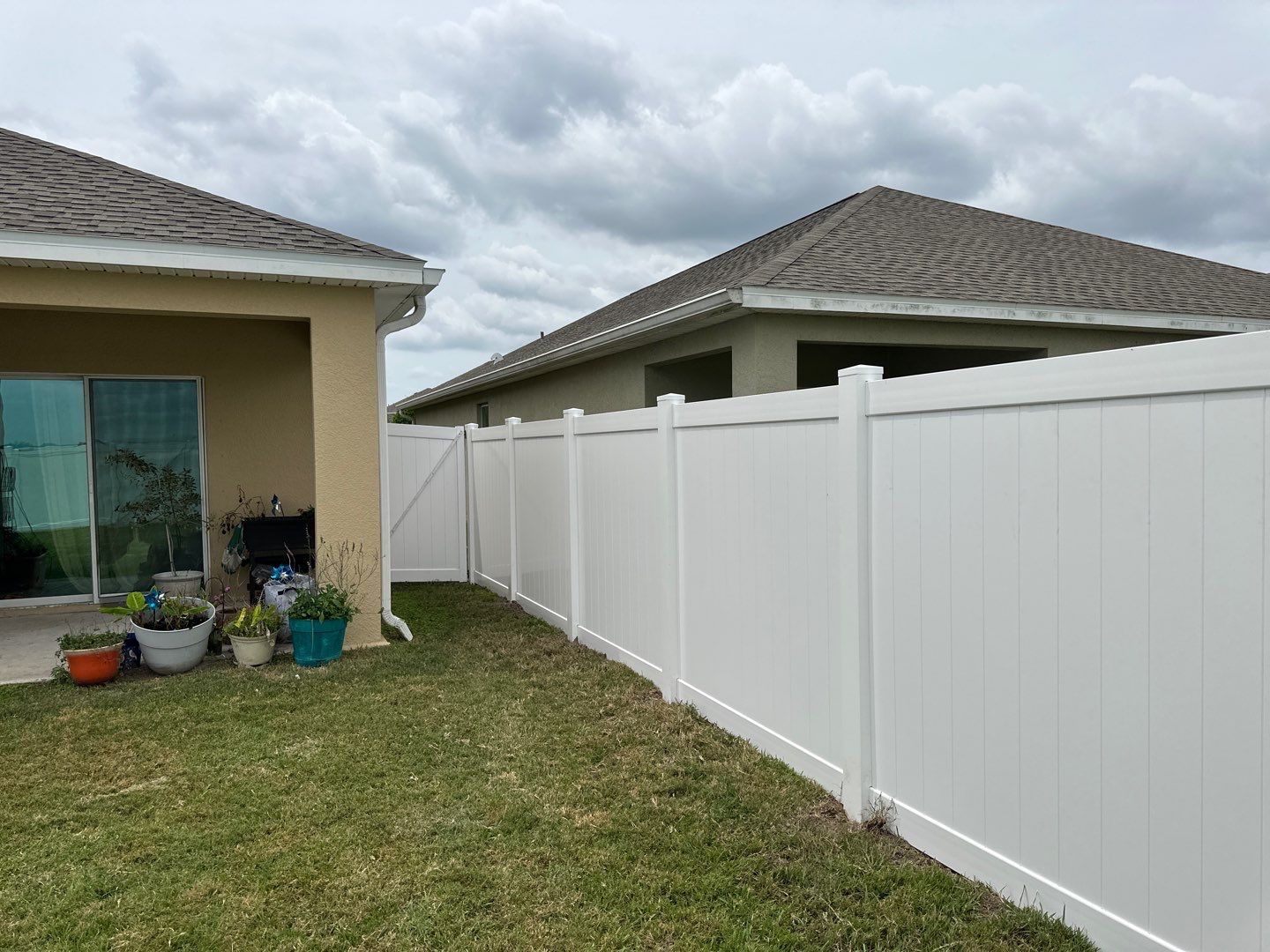 Aluminum Fence Installation using Vinyl Privacy Fence  by Asap fence and gates, LLC