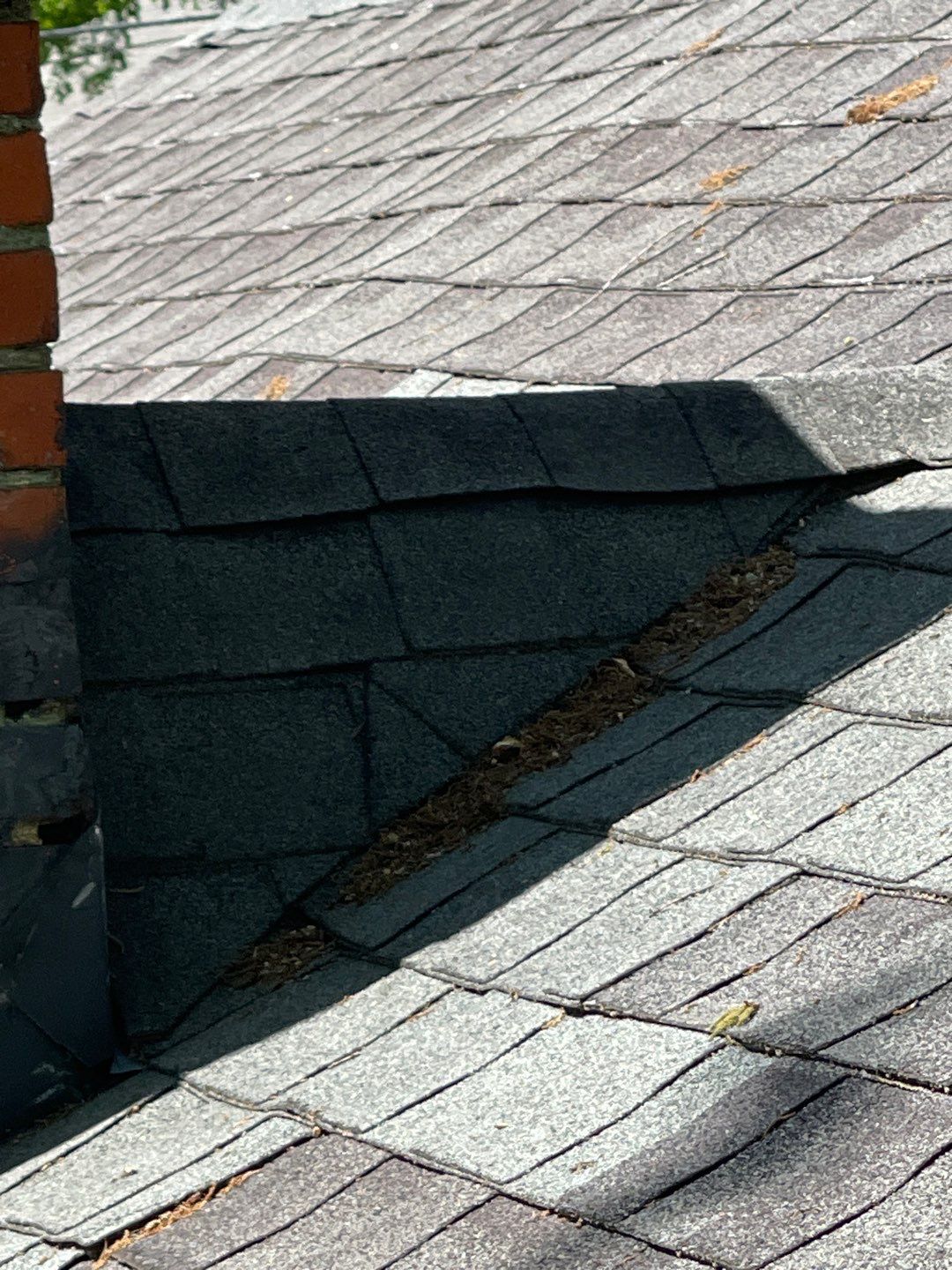 roof replacement and new black gutters by Nailed It Roofing & Remodeling LLC